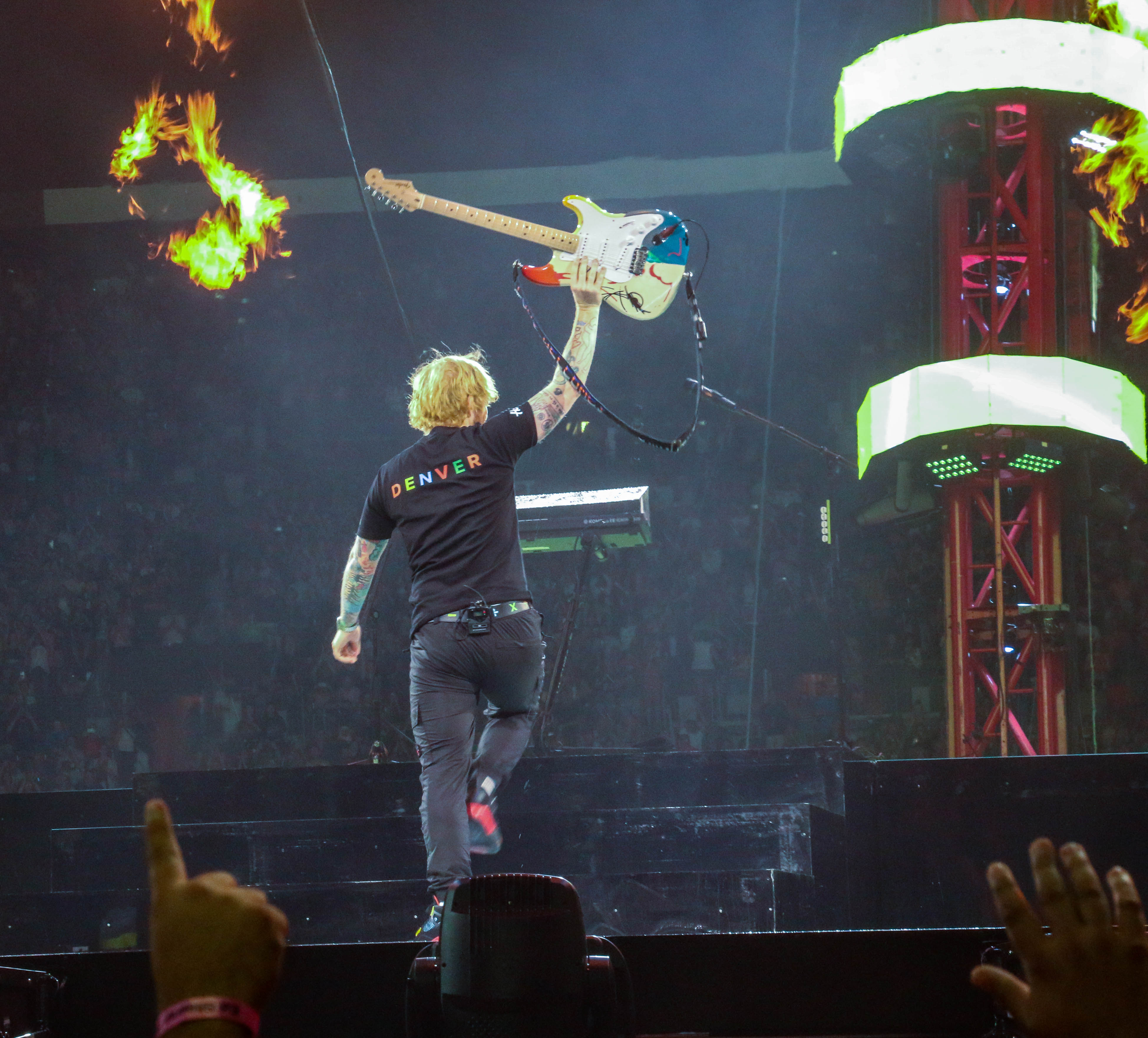 Ed Sheeran, sporting a 'Denver' T-Shirt, performs in concert at Empower Field at Mile High Stadium in Denver on Aug. 19, 2023. (JOHN MOORE, Denver Gazette)
