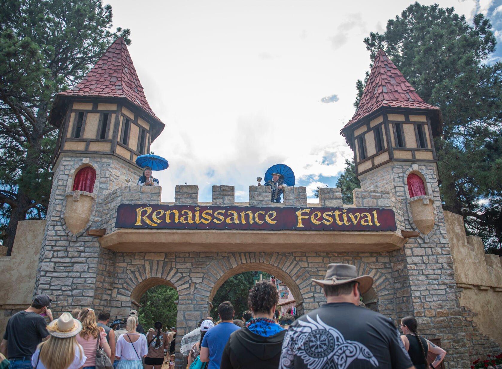 A lord and lady look over thro crowd of attendees at the Colorado Renaissance Festival in Colorado Springs, Co., on Saturday, July 29, 2023. (Gabi Broekema, The Gazette) (Gabi Broekema)
