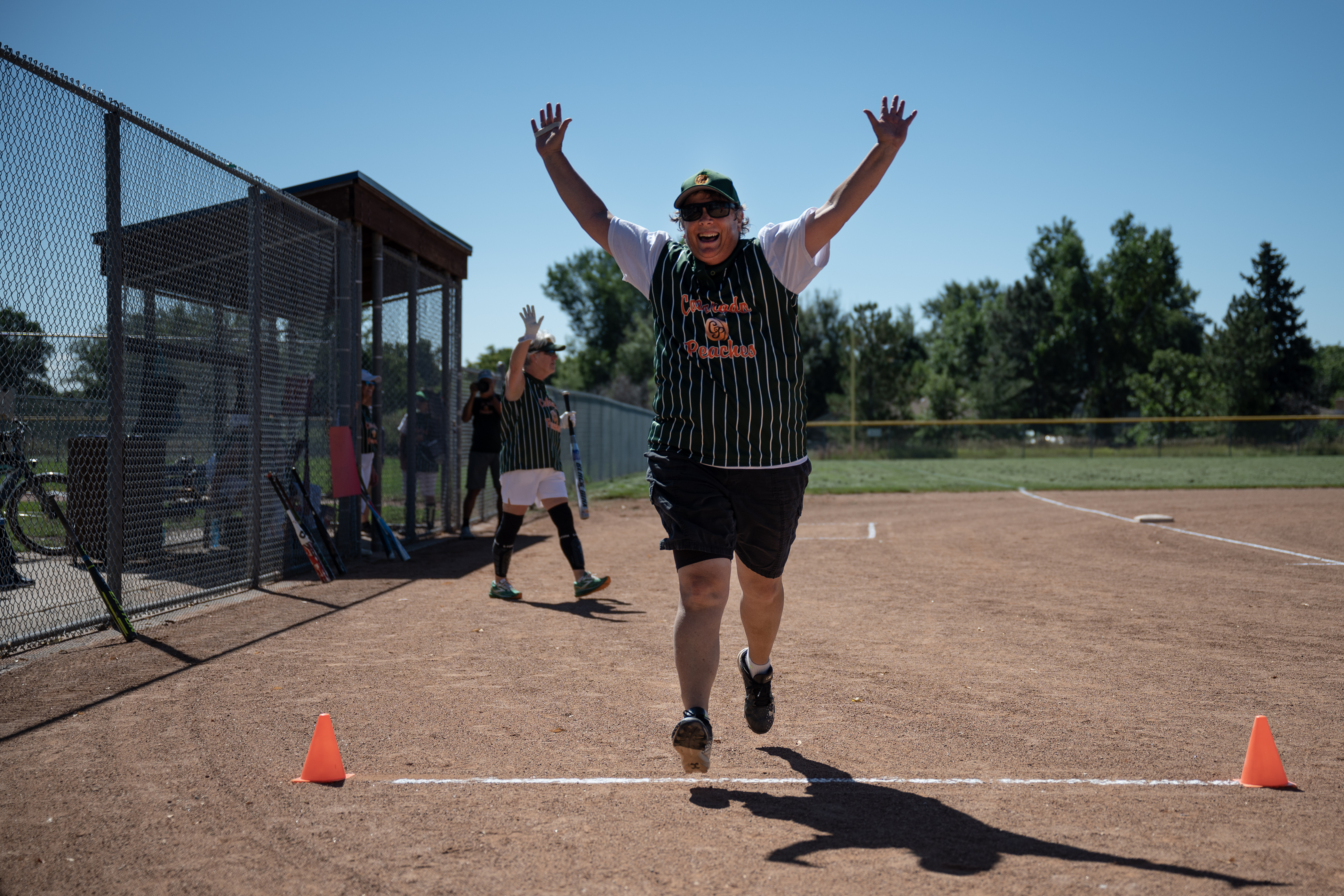 Colorado Peaches coach Heidi Muller (12), playing for the Tarts, crosses the home plate marker after hitting an in-park home run against the Turnovers during the Second Annual Gail Klock Memorial Peach Bowl on Tuesday, Aug. 29, 2023, at Addenbrooke Park in Lakewood, Colo. (Timothy Hurst/Denver Gazette) (TimHursttim.hurst@gazette.comhttps://secure.gravatar.com/avatar/aca82bd62b4ee425c598527cd6faa1b1?d=mm&r=g)
