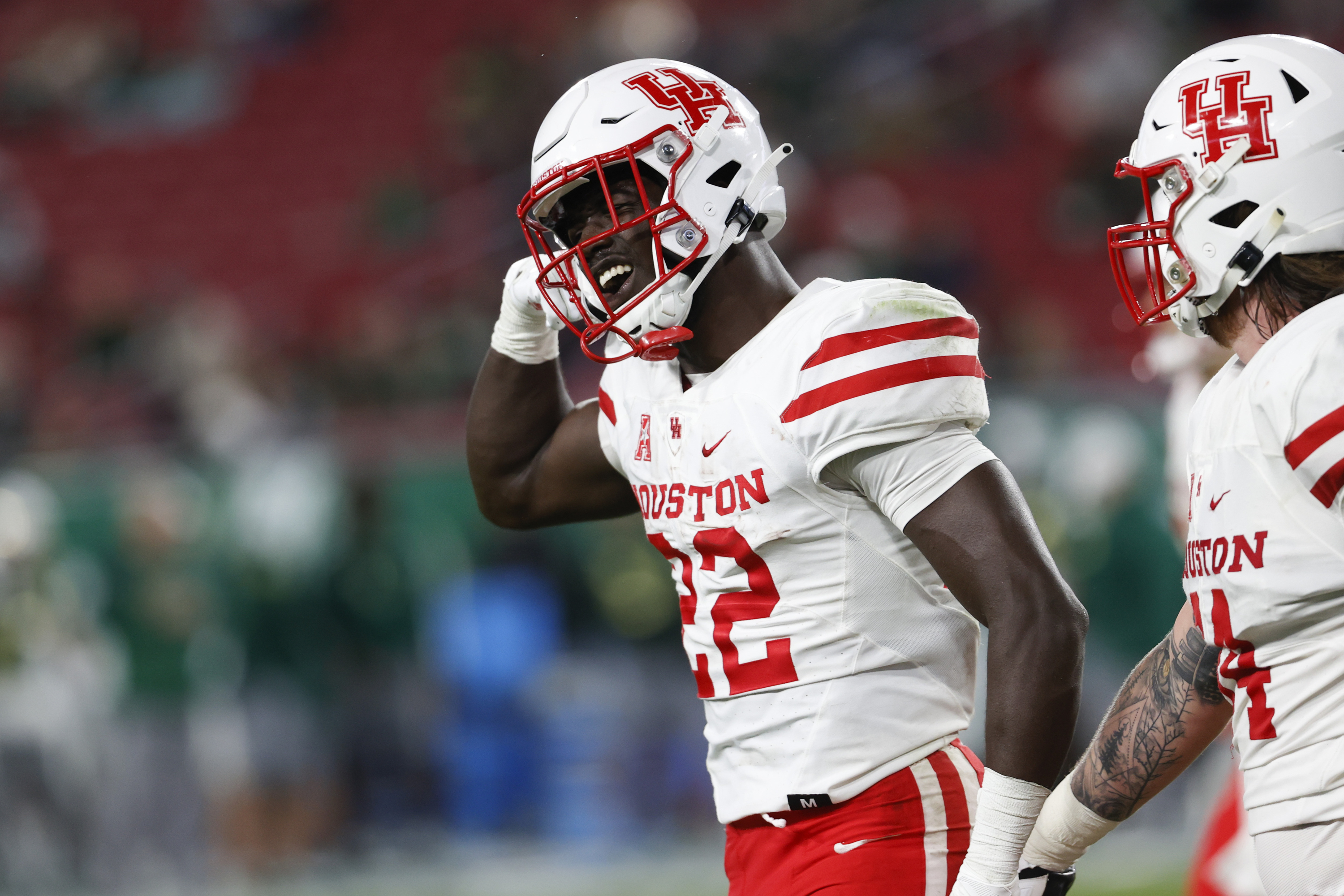 Houston running back Alton McCaskill reacts after scoring against South Florida during the second half of an NCAA college football game Saturday, Nov. 6, 2021, in Tampa, Fla. (AP Photo/Scott Audette) (Scott Audette)