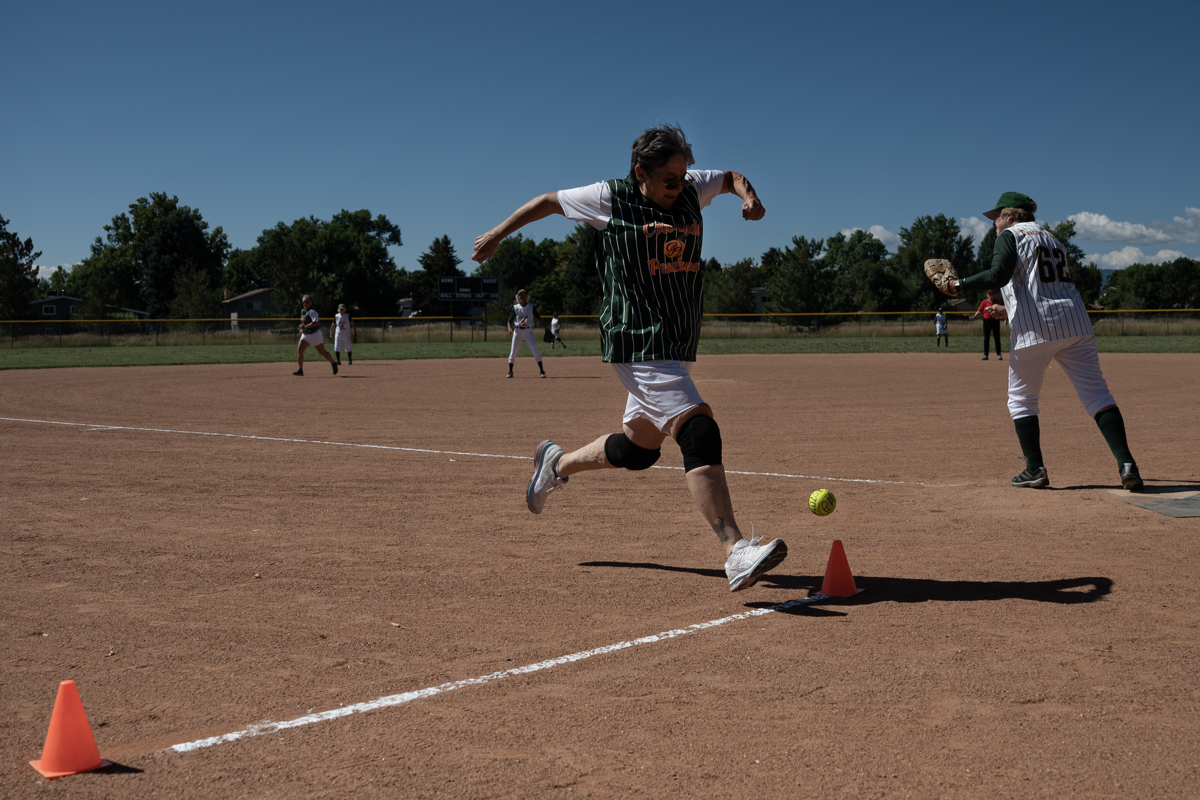 Colorado Peaches Tarts player “Sandy R” Roudebush (22) crosses the home plate marker just before the ball in a game against the Turnovers during the Second Annual Gail Klock Memorial Peach Bowl on Tuesday, Aug. 29, 2023, at Addenbrooke Park in Lakewood, Colo. (Timothy Hurst/Denver Gazette) (TimHursttim.hurst@gazette.comhttps://secure.gravatar.com/avatar/aca82bd62b4ee425c598527cd6faa1b1?d=mm&r=g)