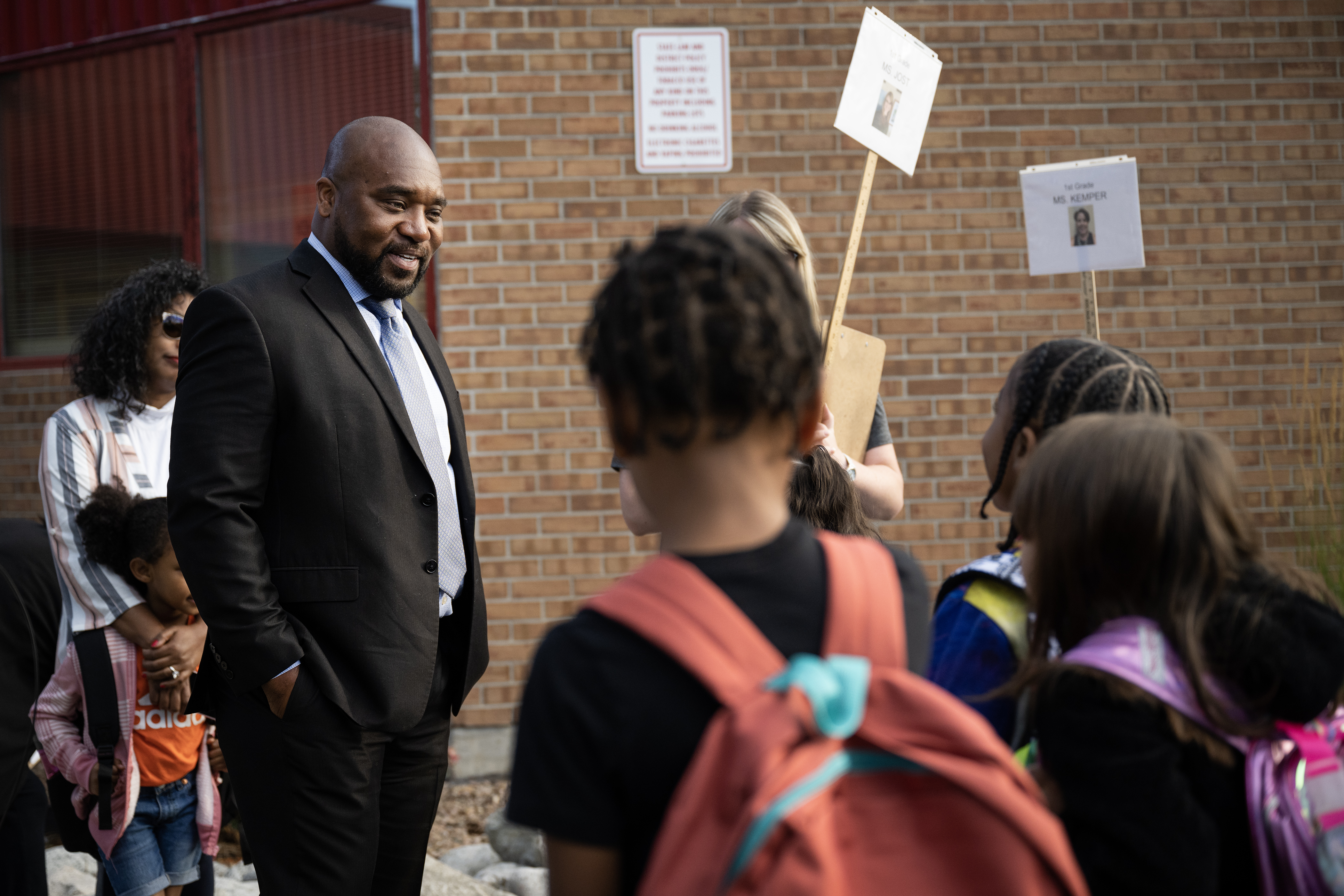 Aurora Public Schools as superintendent Michael Giles Jr. talks with students who wait to head inside with their classes on the first day of school at Jewell Elementary School on Tuesday, Aug. 8, 2023, in Aurora, Colo. (Timothy Hurst/Denver Gazette) (TimHursttim.hurst@gazette.comhttps://secure.gravatar.com/avatar/aca82bd62b4ee425c598527cd6faa1b1?d=mm&r=g)