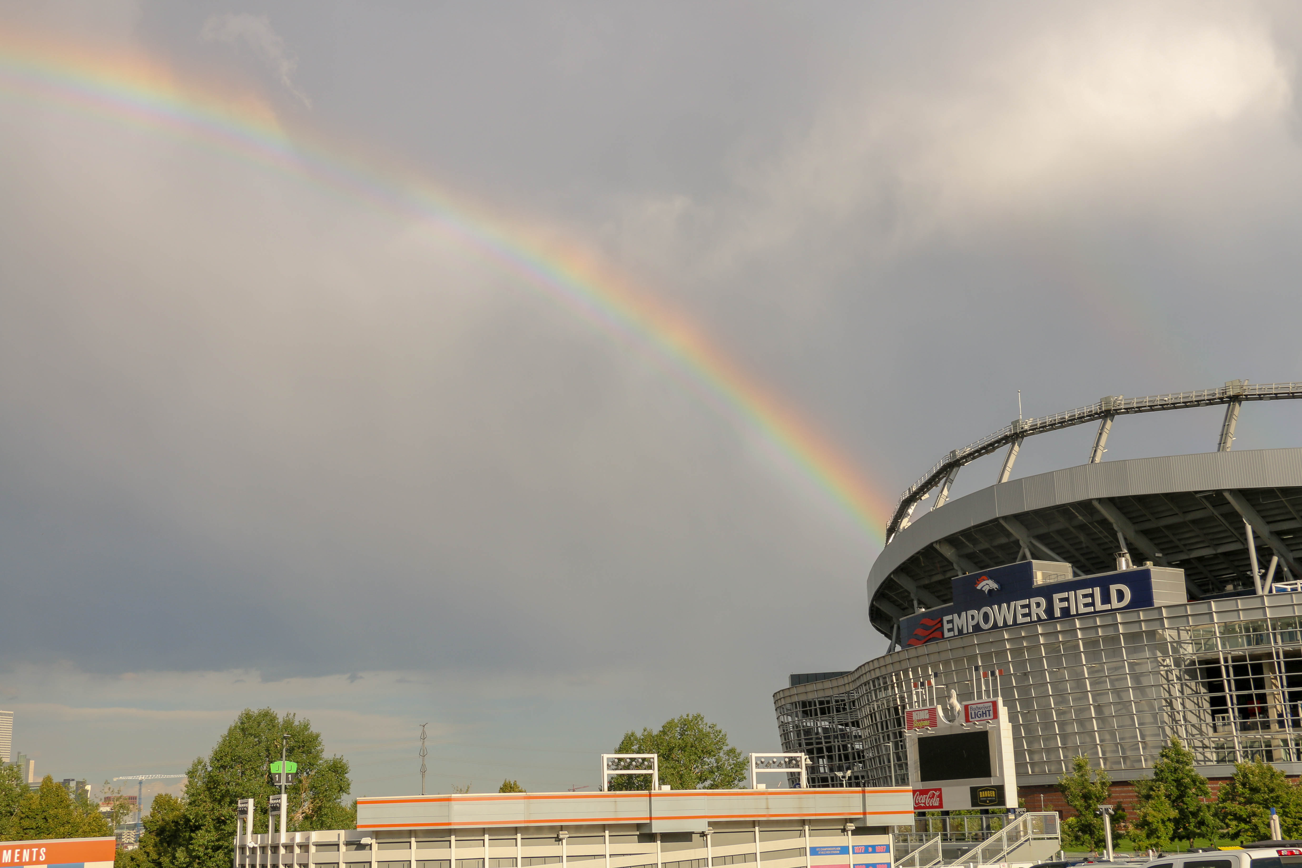 The scene outside Empower Field at Mile High Stadium just before a three-hour lightning delay for a concert by Ed Sheeran and Khalid on Aug. 19, 2023. (JOHN MOORE, Denver Gazette)