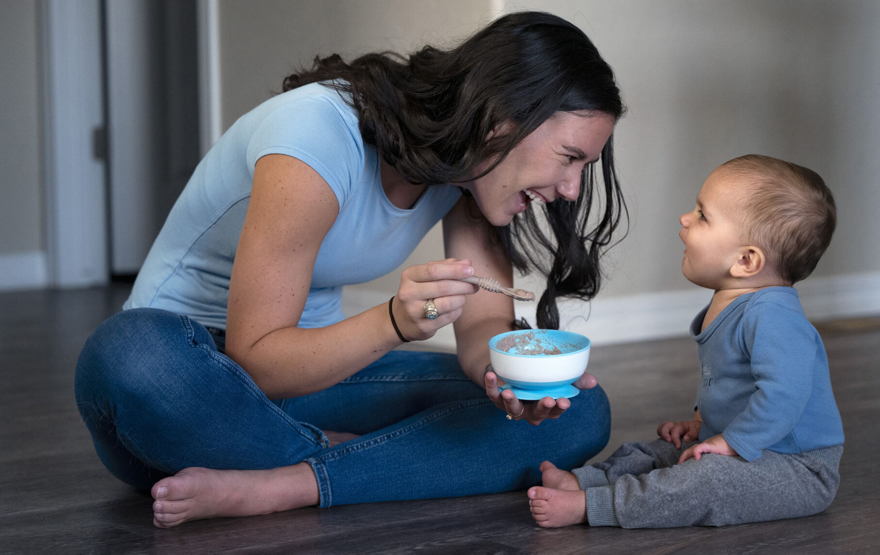 Sarah Swan feeds her 9-month-old son Mateo Cardenas after a long day of classes at the Air Force Academy Friday, Aug. 18, 2023. (The Gazette, Christian Murdock) (Christian Murdock/The Gazette)
