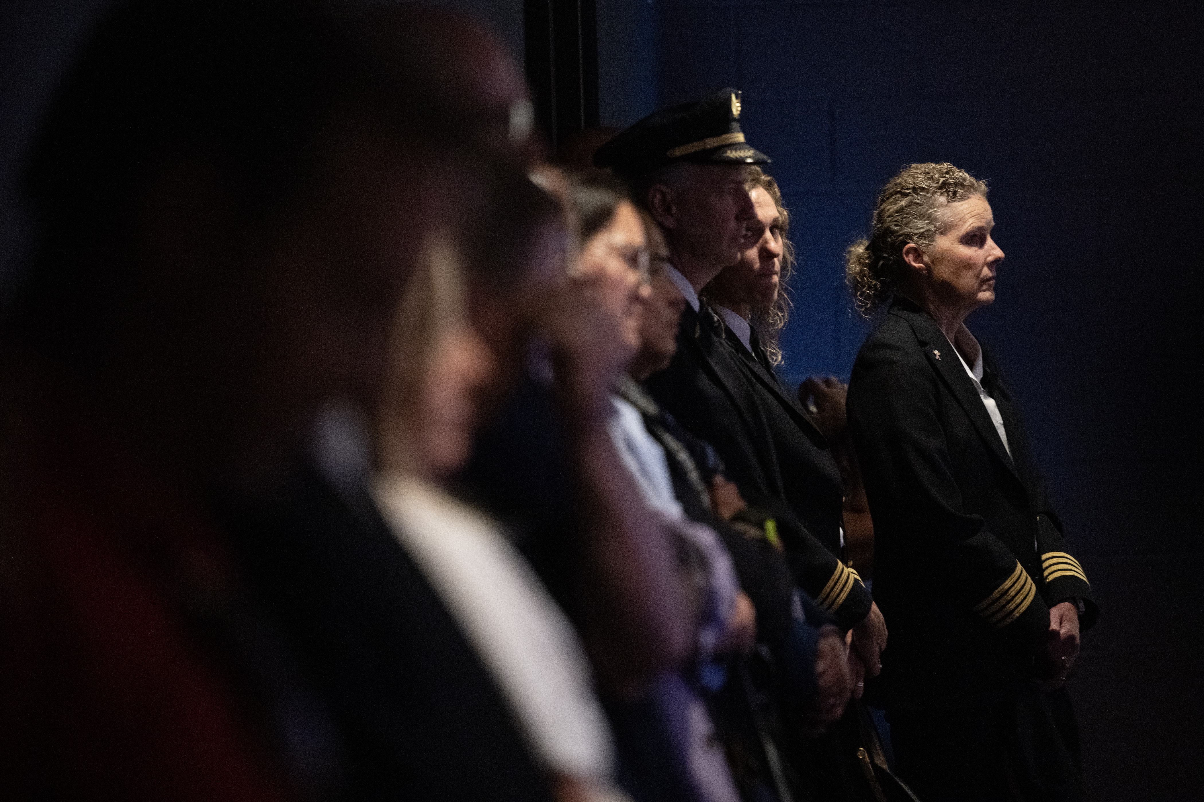 United Airlines employees line the back of the auditorium during an event to announce the partnership between Metropolitan State University of Denver and United Airlines to address an industry pilot shortage on Friday, Aug. 18, 2023, at MSU Denver’s King Center in Denver. (Timothy Hurst/Denver Gazette) (TimHursttim.hurst@gazette.comhttps://secure.gravatar.com/avatar/aca82bd62b4ee425c598527cd6faa1b1?d=mm&r=g)