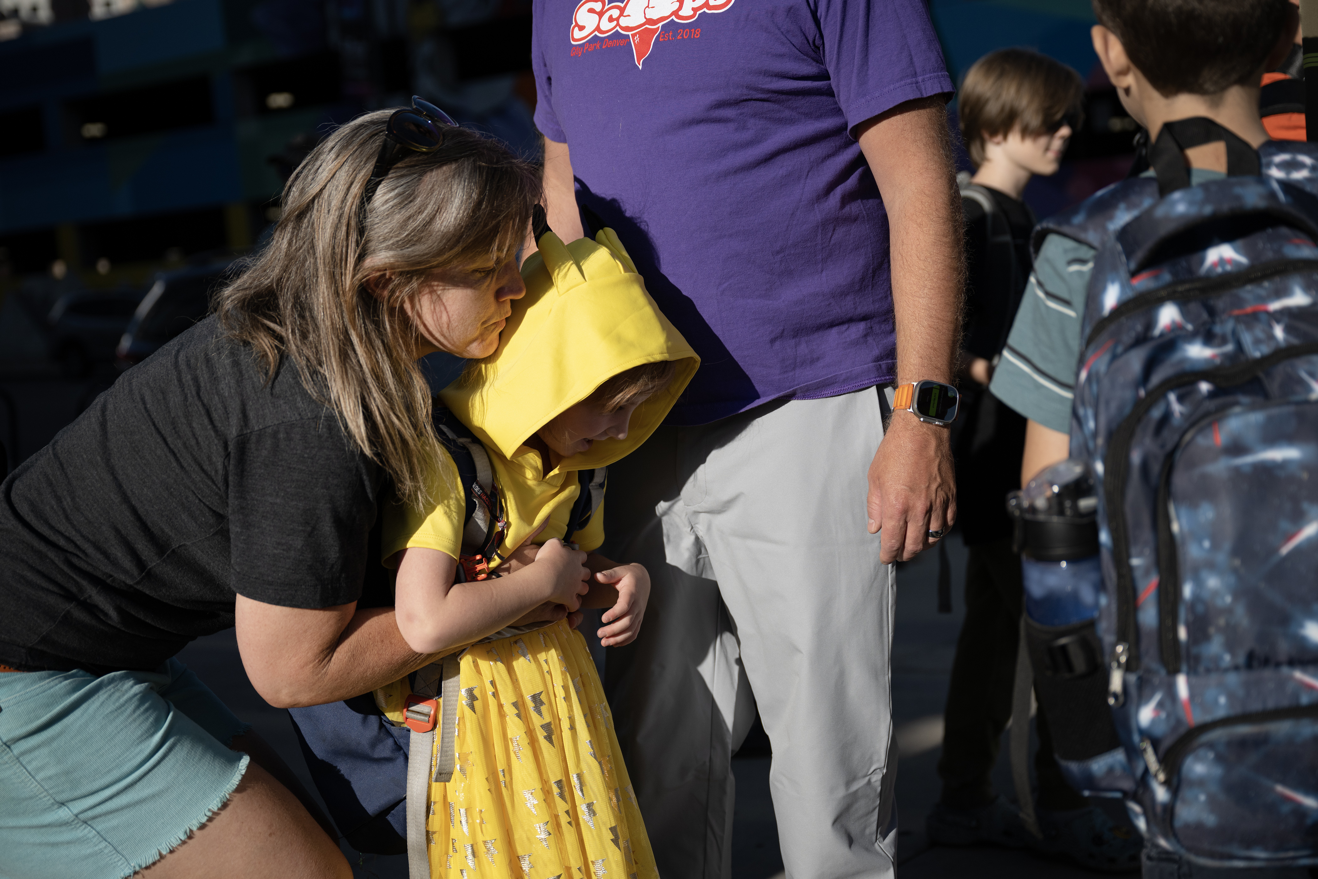 FILE PHOTO: Lauri Keener hugs her daughter Phoenix Lawson before they head across the street to drop Phoenix off with her classmates during the first day of Denver Public School’s Fall semester on Monday, Aug. 21, 2023, at Downtown Denver Expeditionary School in Denver, Colo.(Timothy Hurst/Denver Gazette) (TimHursttim.hurst@gazette.comhttps://secure.gravatar.com/avatar/aca82bd62b4ee425c598527cd6faa1b1?d=mm&r=g)