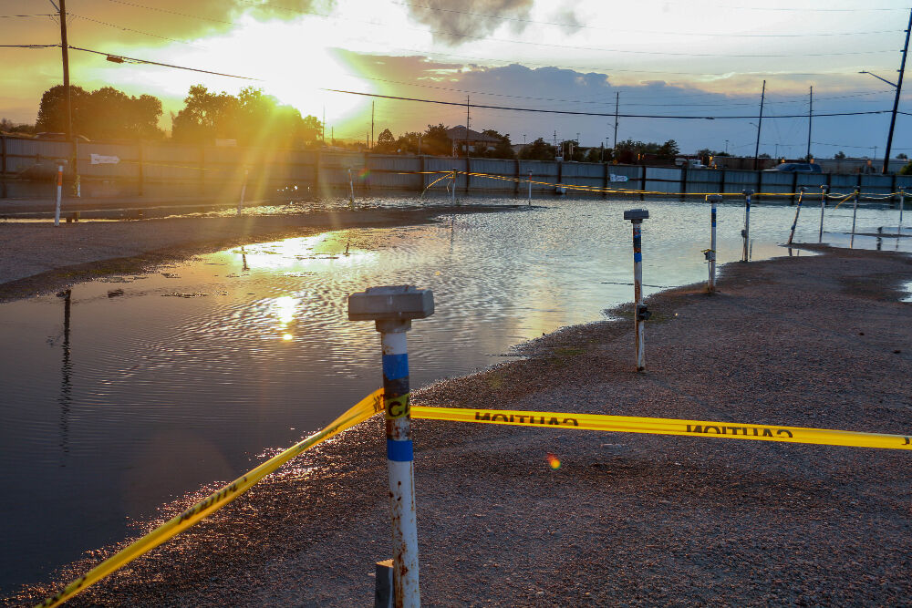 The western half of the 88 Drive-in, for some unspecified reason is half-covered in standing water. Photo taken Aug. 8, 2023. (John Moore, Denver Gazette)