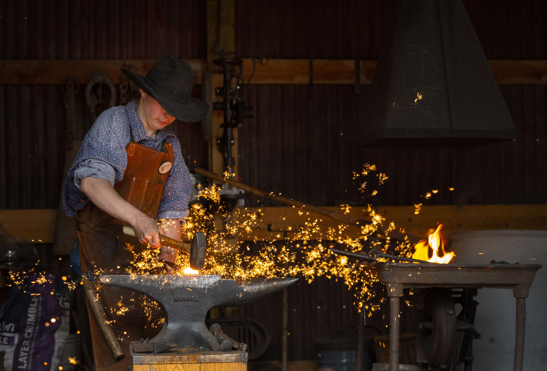 Connor Knowles, 13, works in the blacksmith shop at the Francisco Fort Museum in La Veta, Colo. on Tuesday, Aug. 1, 2023 this month. Knowles started working in the craft at age 7. (Christian Murdock/The Gazette)