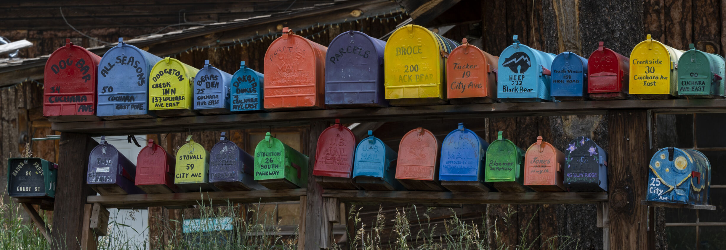 Colorful mailboxes line the road in Cuchara, Colo., Tuesday, Aug. 1, 2023. (Christian Murdock/The Gazette)