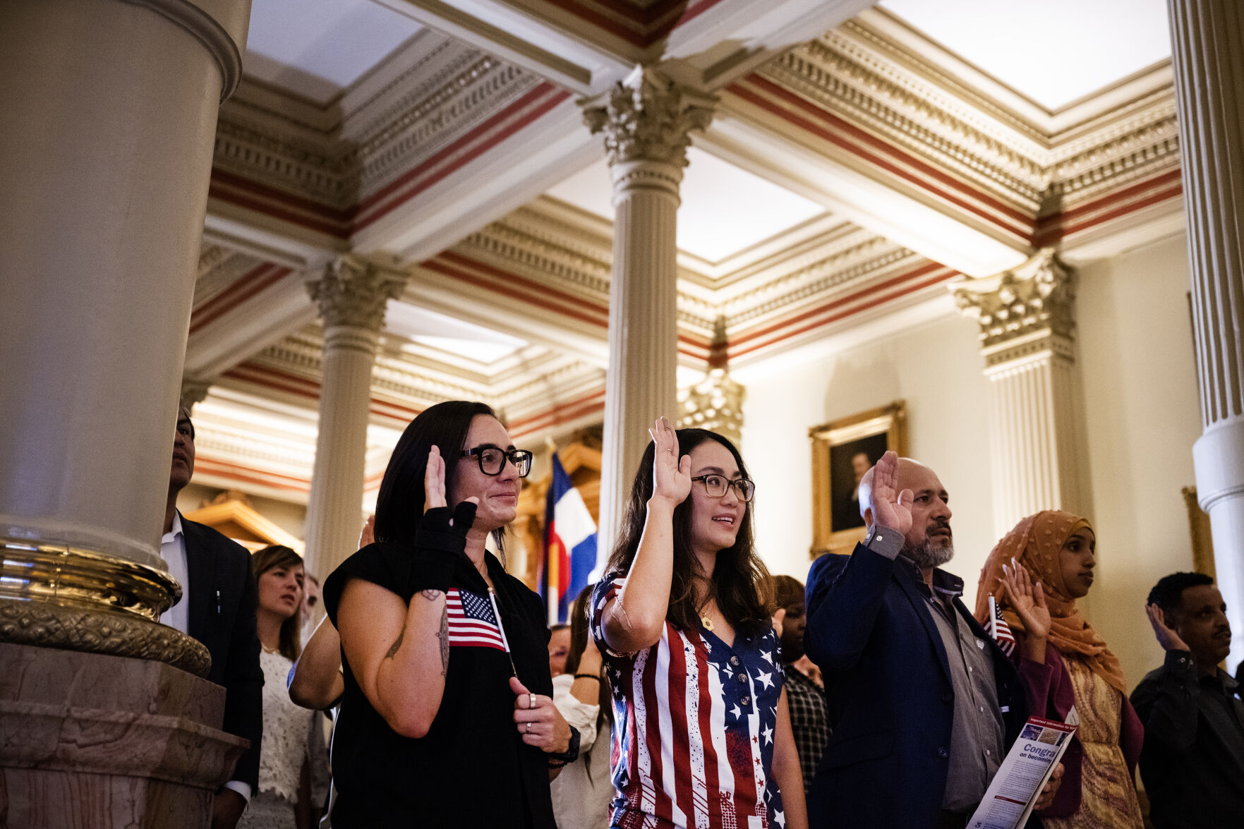 35 new U.S. citizens take the Oath of Allegiance during a naturalization ceremony at the Colorado State Capitol building on Tuesday, Aug. 1, 2023, in Denver, Colo. The new citizens from 20 different countries took the Oath of Allegiance from United States Citizenship and Immigration Services Kansas City district director David Douglas, held at the Capitol in celebration of the 147th anniversary of President Ulysses S. Grant signing a proclamation that officially declared Colorado a state. (Timothy Hurst/Denver Gazette) (TimHursttim.hurst@gazette.comhttps://secure.gravatar.com/avatar/aca82bd62b4ee425c598527cd6faa1b1?d=mm&r=g)