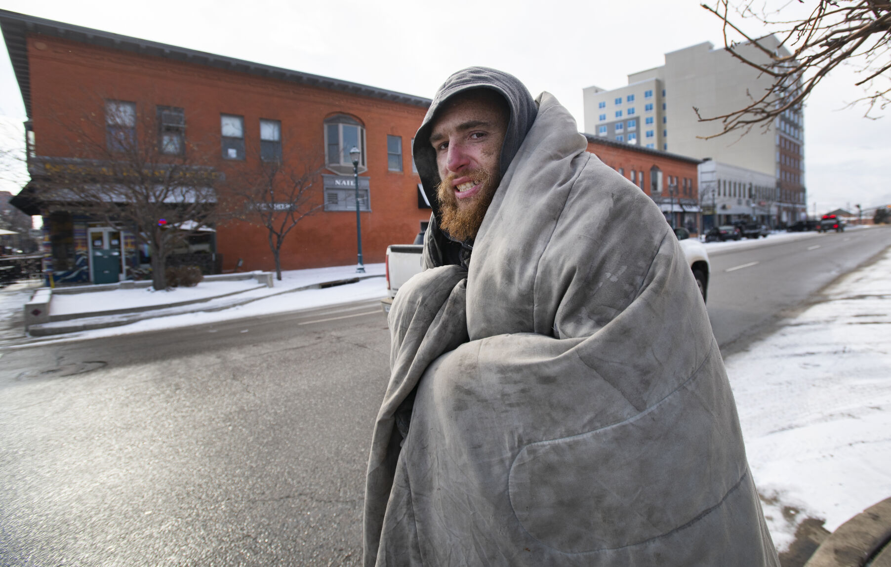 Ryan Ohlberg battled the cold on the streets of downtown Colorado Springs last January. (Christian Murdock, The Gazette file)
