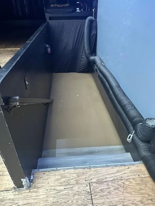 Water form the basement of HQ filled all the way up to the main floor. (Courtesy HQ handout)