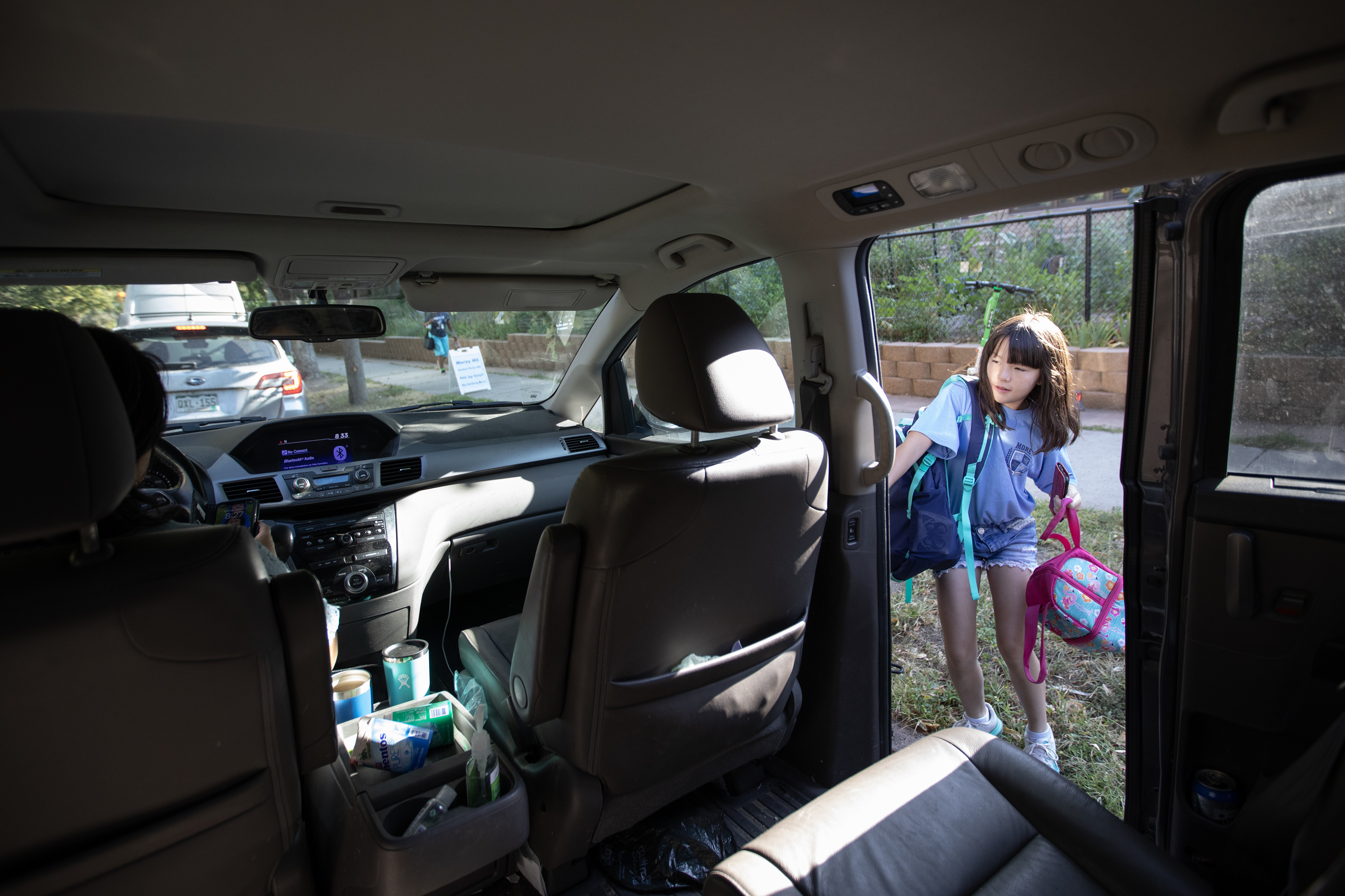 Sixth grader Mai Archibald, 11, says goodbye to her mother Lynne Ly as she’s dropped off at Morey Middle School on Tuesday, Aug. 22, 2023, in Denver, Colo.(Timothy Hurst/Denver Gazette) (TimHursttim.hurst@gazette.comhttps://secure.gravatar.com/avatar/aca82bd62b4ee425c598527cd6faa1b1?d=mm&r=g)