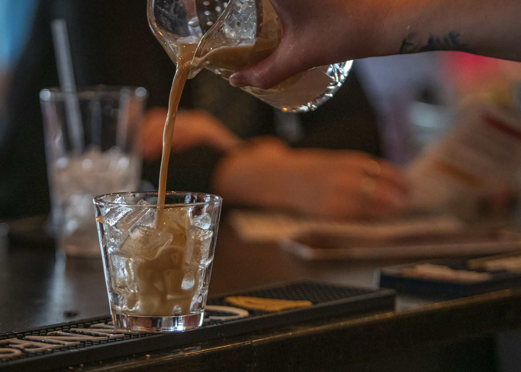 A Chicago Bulldog White Russian is poured into a glass at Lebowski's Taproom in Colorado Springs, Colo. on Wednesday, August 23, 2023. (Gabi Broekema)