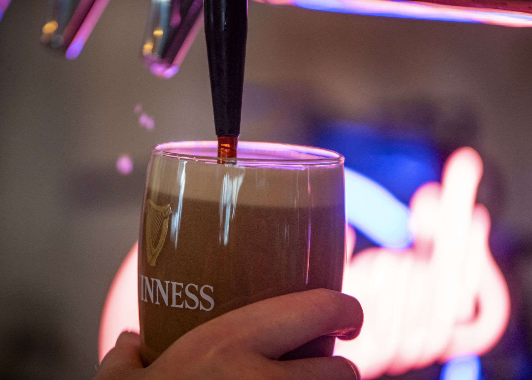 A Guinness beer is poured from the tap at Lebowski's Taproom in Colorado Springs, Colo. on Wednesday, August 23, 2023. (Gabi Broekema)