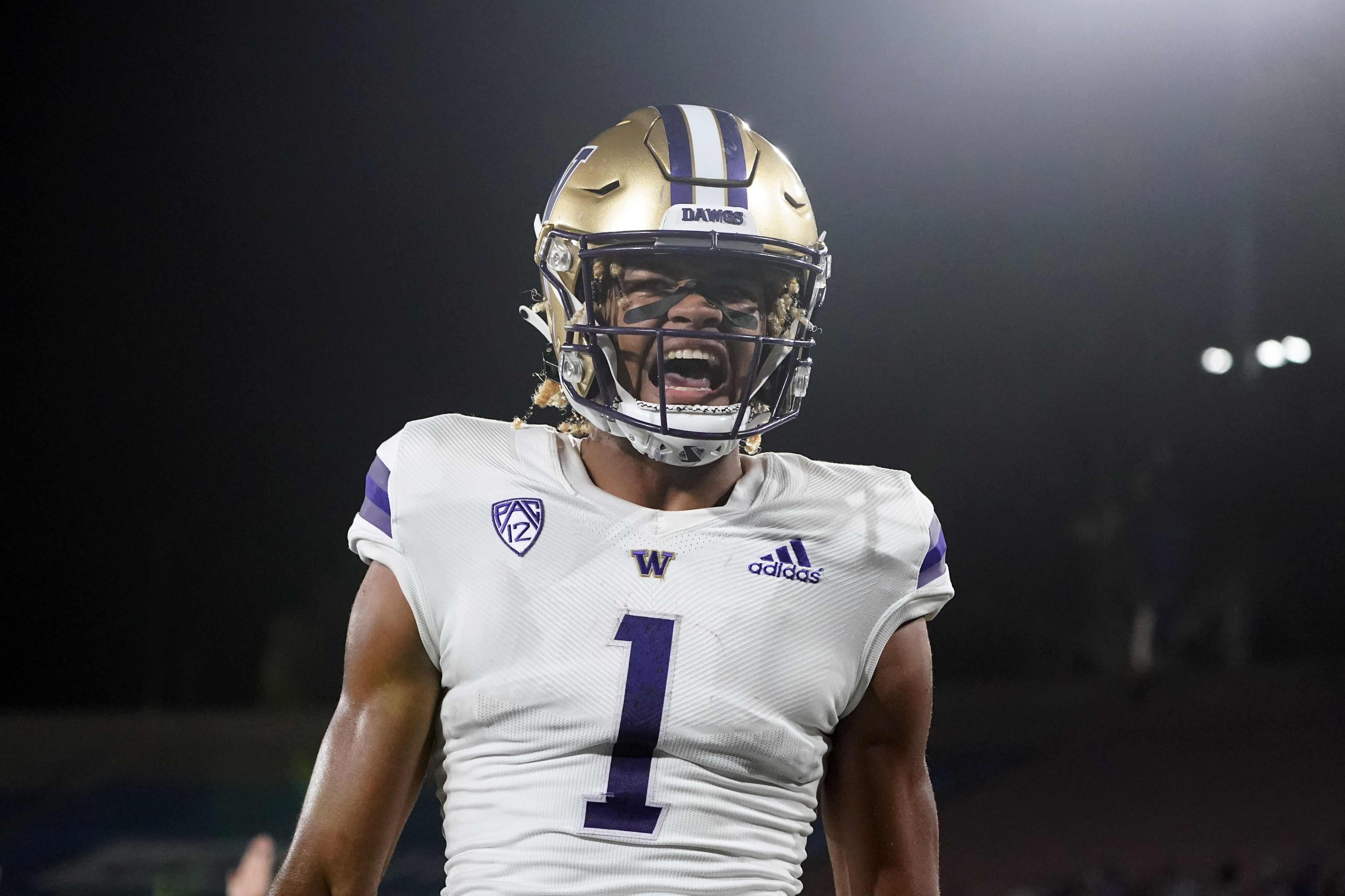 Washington wide receiver Rome Odunze (1) celebrates after catching a touchdown during the first half of an NCAA college football game against UCLA Friday, Sept. 30, 2022, in Pasadena, Calif. (AP Photo/Marcio Jose Sanchez) (Marcio Jose Sanchez)