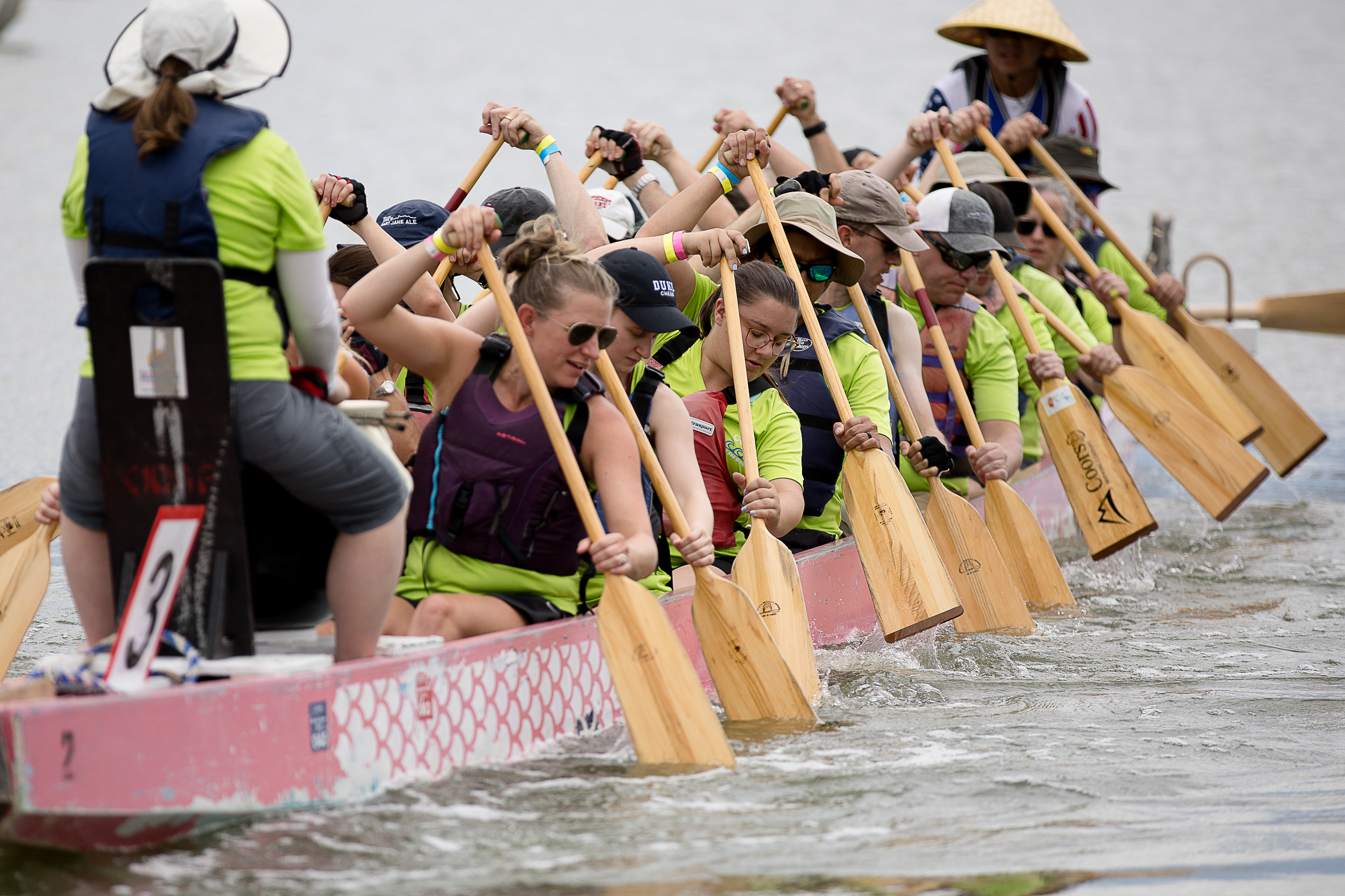 Competitors paddle the one-ton boat out onto Sloan's Lake for a dragon-boat race on July 24, 2022. The organization that runs the festival is among the recipients of new Colorado Creates grants. (Sara Hertwig for The Denver Gazette)