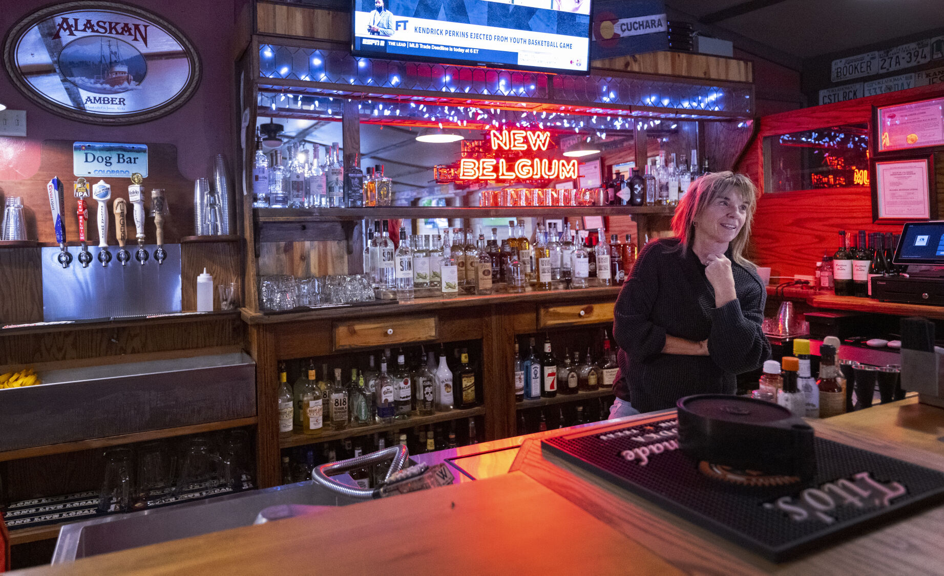 Melissa Fassiotto works the bar of her family’s restaurant, the Dog Bar and Grill, in Cuchara, Colo., Tuesday, Aug. 1, 2023. Fassiotto’s family first came to the valley in the 1920s. (PHOTOS BY CHRISTIAN MURDOCK, The Gazette)