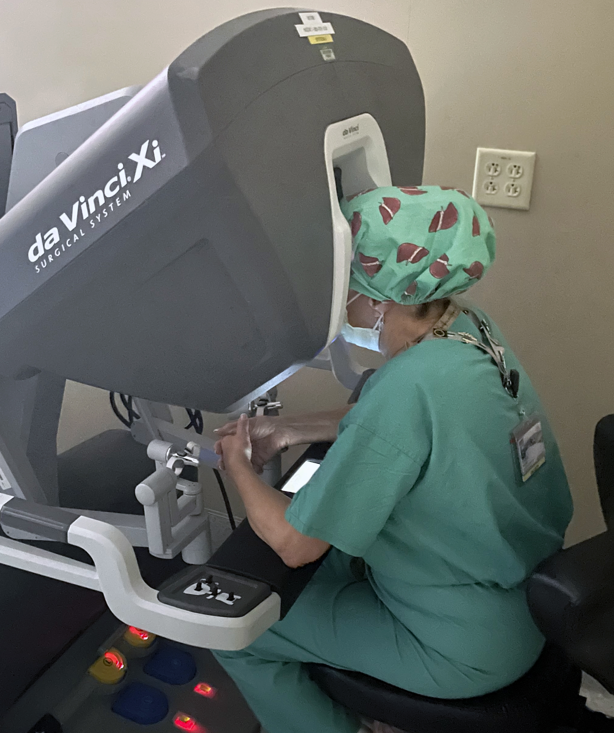 A UCHealth University of Colorado Hospital surgeon manipulates the robot performing a liver transplant. (Courtesy of UCHealth)
