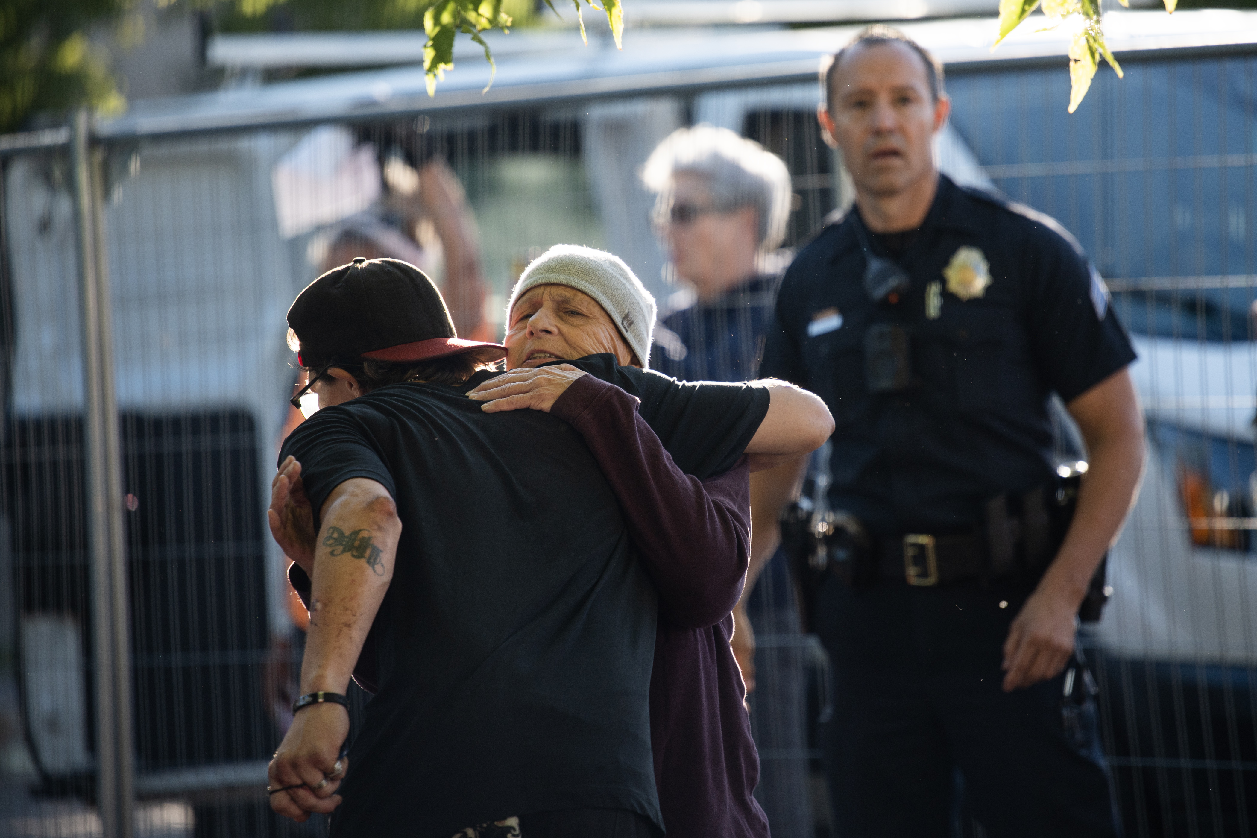 Kelsang Virya, the founder of Mutual Aid Monday, hugs David Sjoberg as he packs up his camp site during the first encampment sweep under the Johnston administration at an encampment at 22nd and Stout streets on Friday morning, Aug. 4, 2023, in Denver, Colo. (Timothy Hurst/Denver Gazette) (TimHursttim.hurst@gazette.comhttps://secure.gravatar.com/avatar/aca82bd62b4ee425c598527cd6faa1b1?d=mm&r=g)