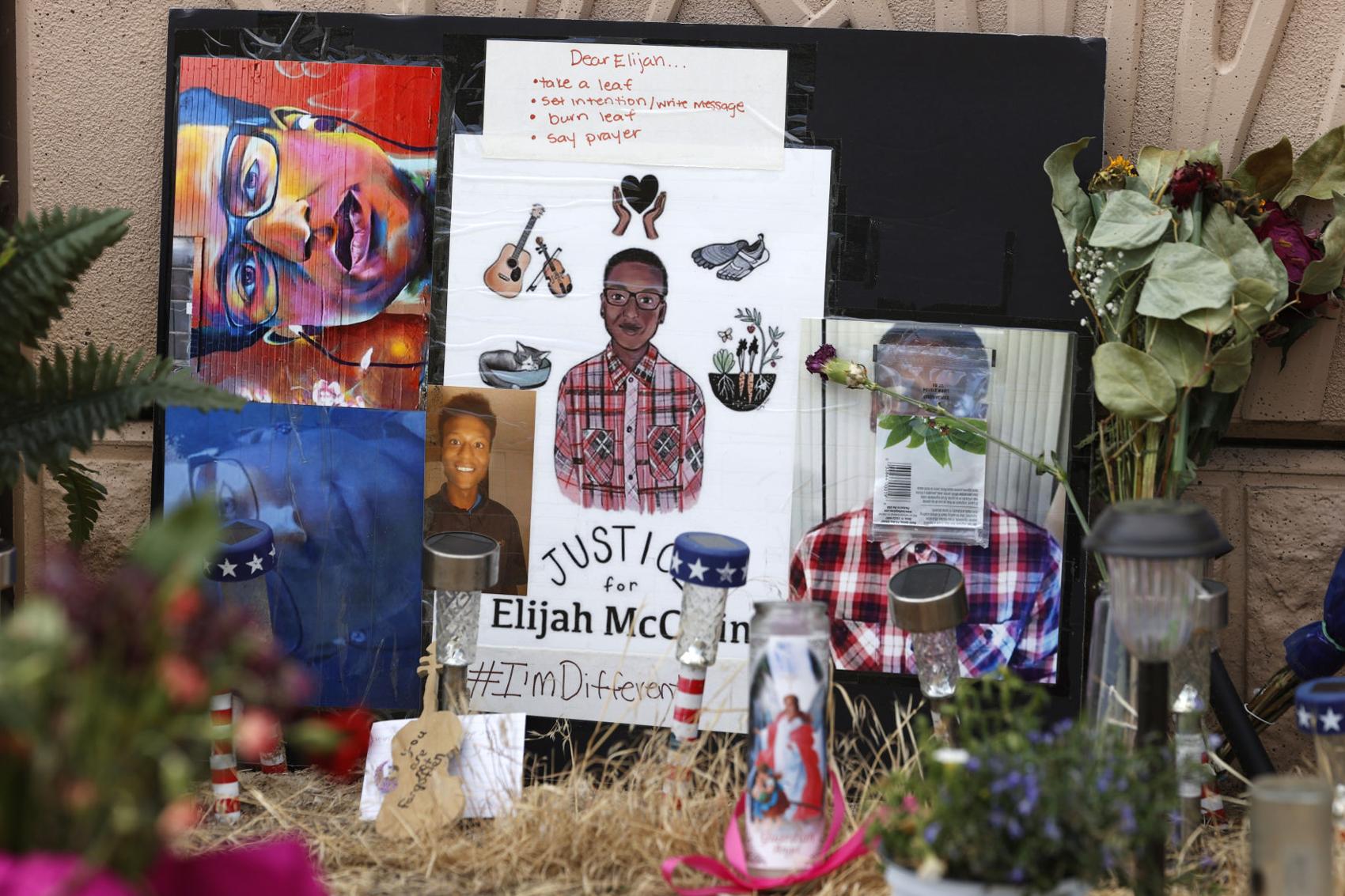 FILE PHOTO: A memorial stands at a site across the street from where Elijah McClain was stopped by Aurora Police Department officers while walking home on Aug. 24, 2019. (David Zalubowski/Associated Press)