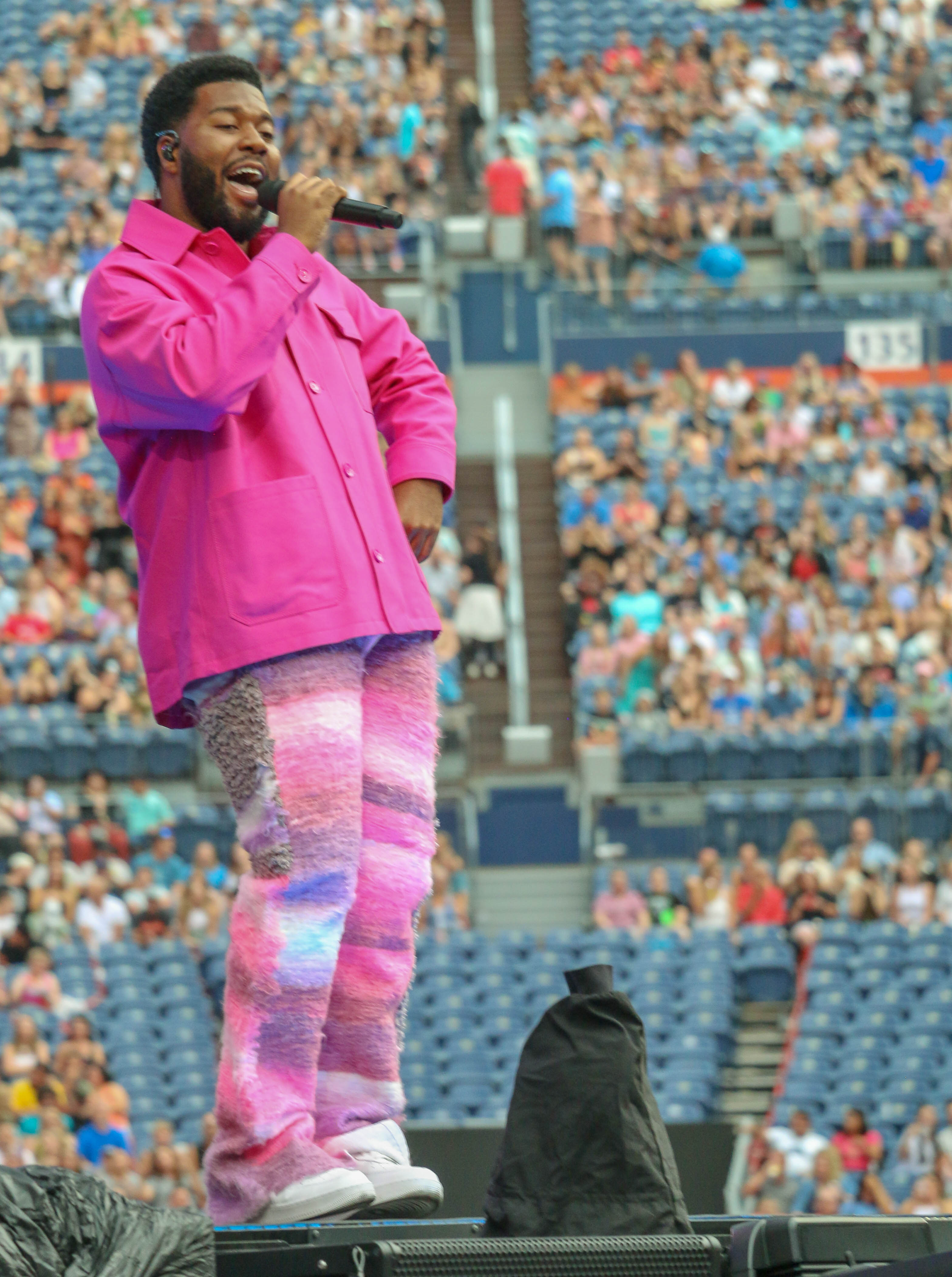 Khalid performs at Empower Field on Aug. 19, 2023, just moments before lightning would end his set prematurely and delay Ed Sheeran's appearance by three hours. (JOHN MOORE, Denver Gazette)