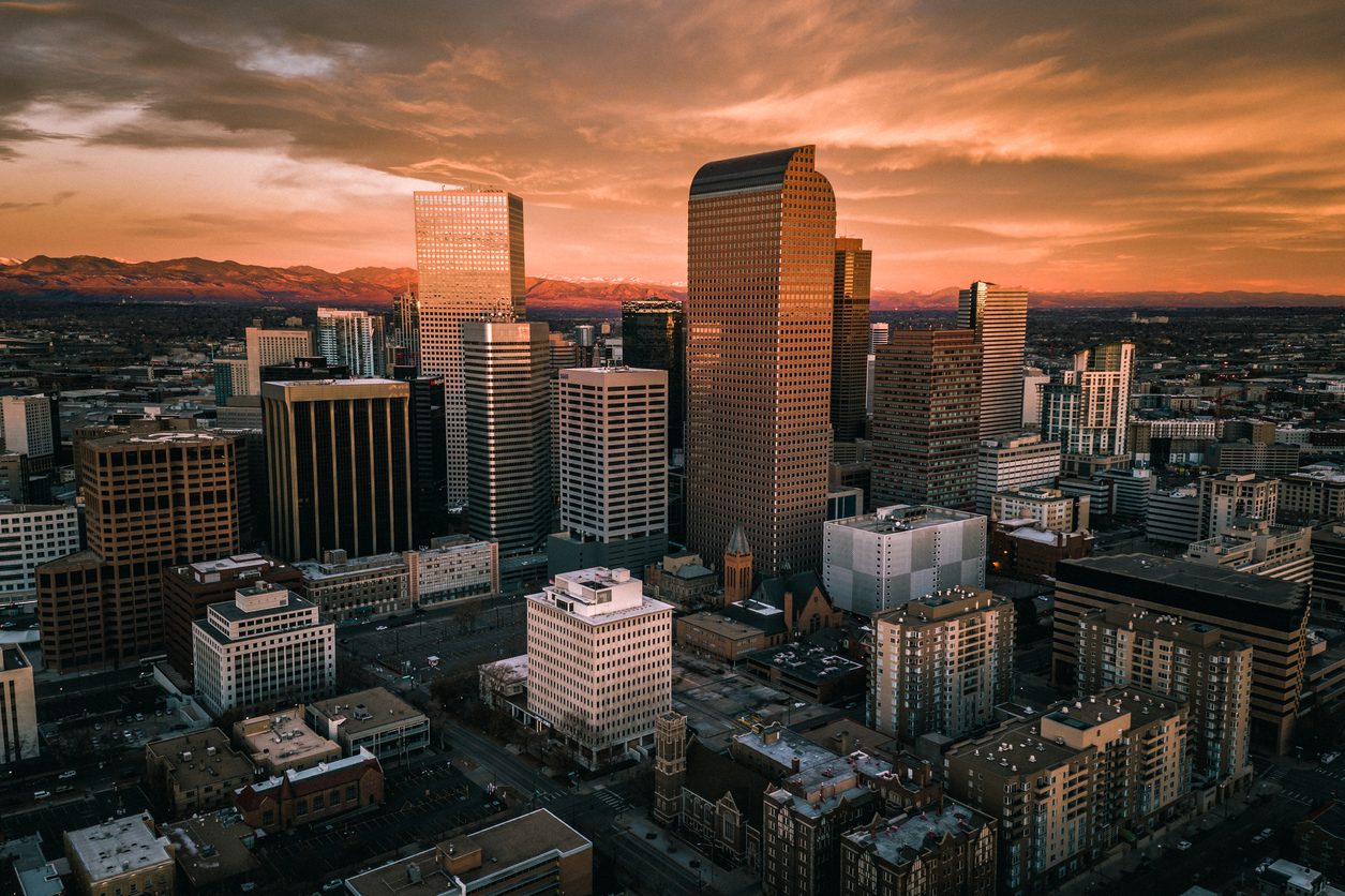 A fiery sunrise over the skyline of Denver. Photo Credit: nick1803 (iStock). (nick1803 via iStock.com)