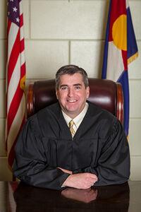 Judge Mike Davidson of the 15th Judicial District last filed his personal financial disclosure statement in 2021.