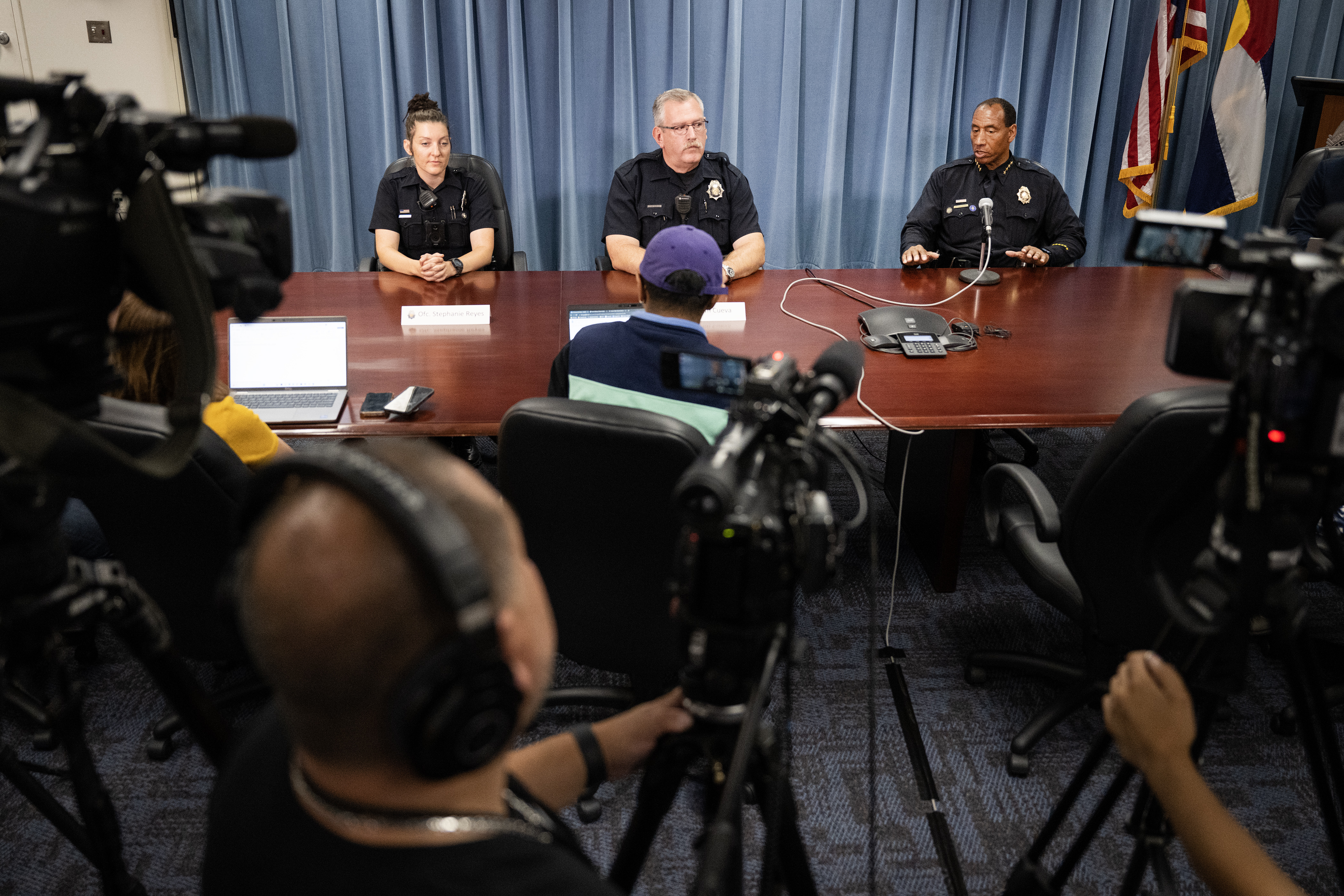 Denver Police Department school resource officers, from left, Stephanie Reyes and Tim Cueva, look on as chief of police Ron Thomas answers a question during a roundtable interview with school resource officers on Friday, Aug. 18, 2023, at the Denver Police Department’s headquarters in Denver. (Timothy Hurst/Denver Gazette) (TimHursttim.hurst@gazette.comhttps://secure.gravatar.com/avatar/aca82bd62b4ee425c598527cd6faa1b1?d=mm&r=g)