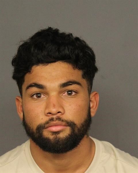 Denver police identify 2 men who ran onto Coors Field, confronted Ronald Acuña Jr.
