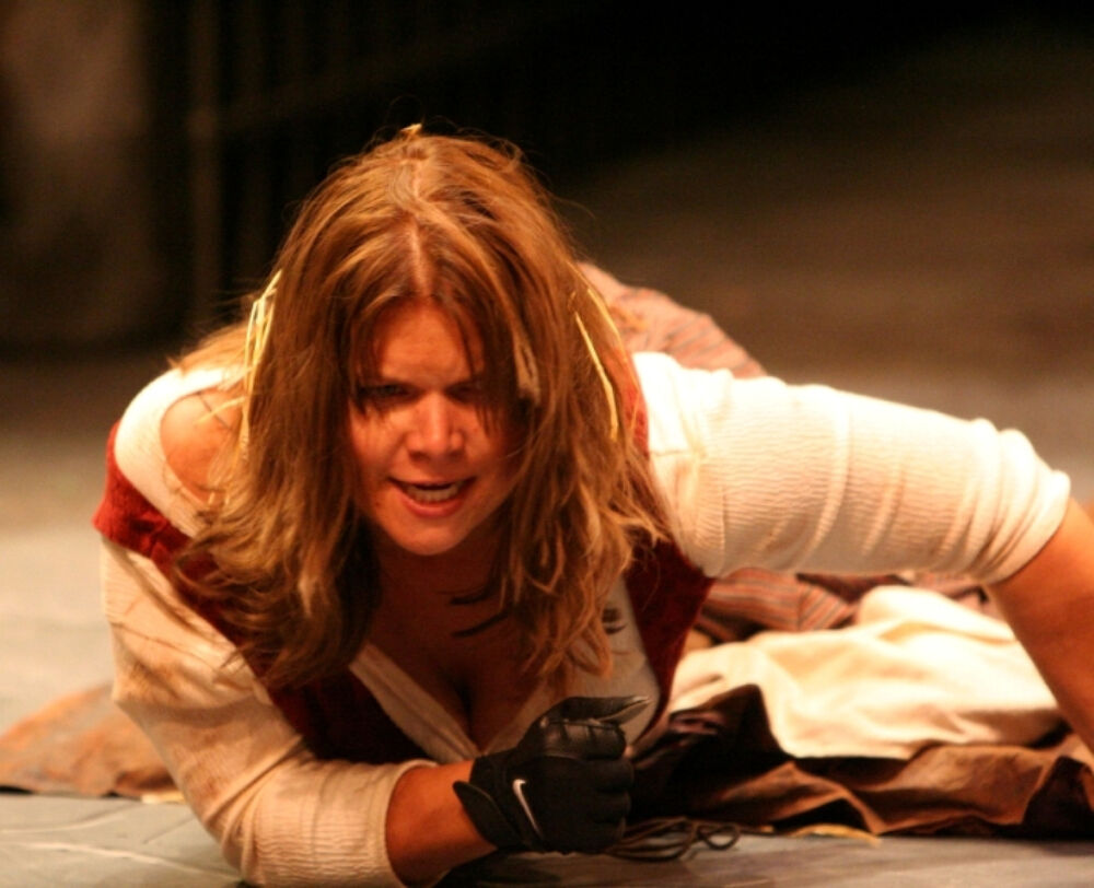 Actor Regan Linton, who is paralyzed from the chest down, delivered a stunning theatergoing moment when she crawled across the stage to get back to her wheelchair in Phamaly Theatre Company's seminal 2009 staging of 'Man of La Mancha.' After a four-year absence, Denver's signature disability-affirmative theater company returns to the Denver Center this week with 'A Midsummer Night's Dream.' (Courtesy Phamaly Theatre Company)