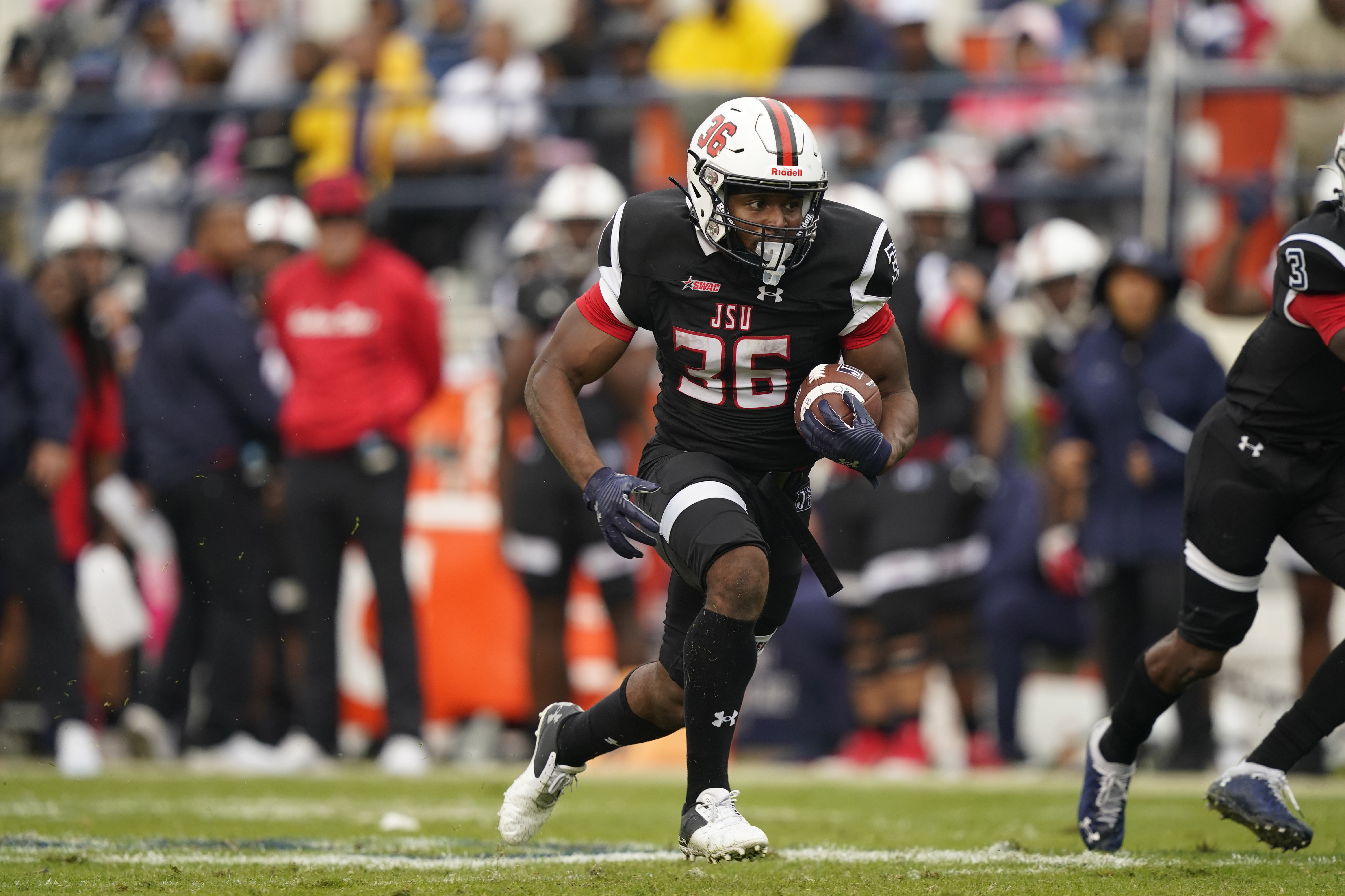 Jackson State running back Sy'veon Wilkerson (36) sprints to a 26-yard touchdown run against Southern University during the second half of an NCAA college football game in Jackson, Miss., Saturday, Oct. 29, 2022. (AP Photo/Rogelio V. Solis) (Rogelio V. Solis)
