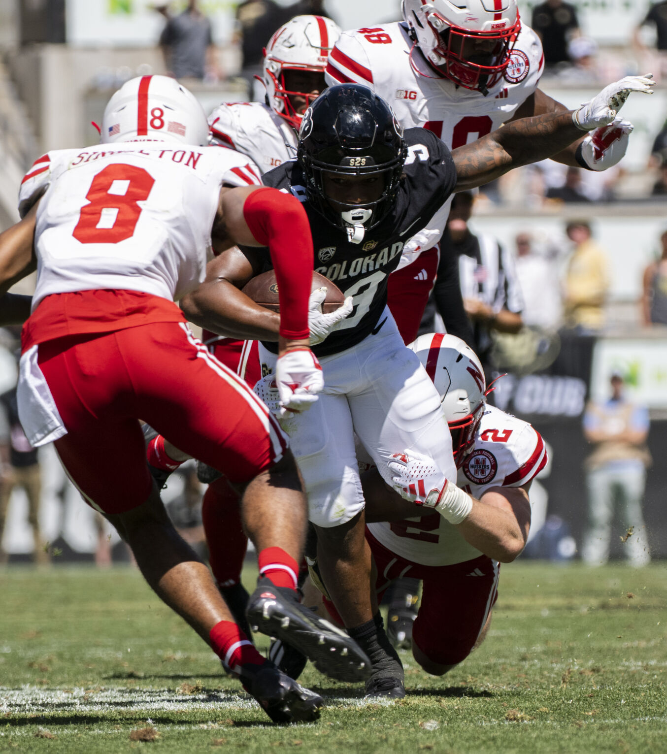 Colorado Buffaloes running back Anthony Hankerson (9)runs for a first down as Nebraska Cornhuskers defensive back Isaac Gifford (2) tries to bring him down during the second half Saturday, Sept. 9, 2023, at Folsom Field in Boulder, Colo. (The Gazette, Christian Murdock) (Christian Murdock/The Gazette)