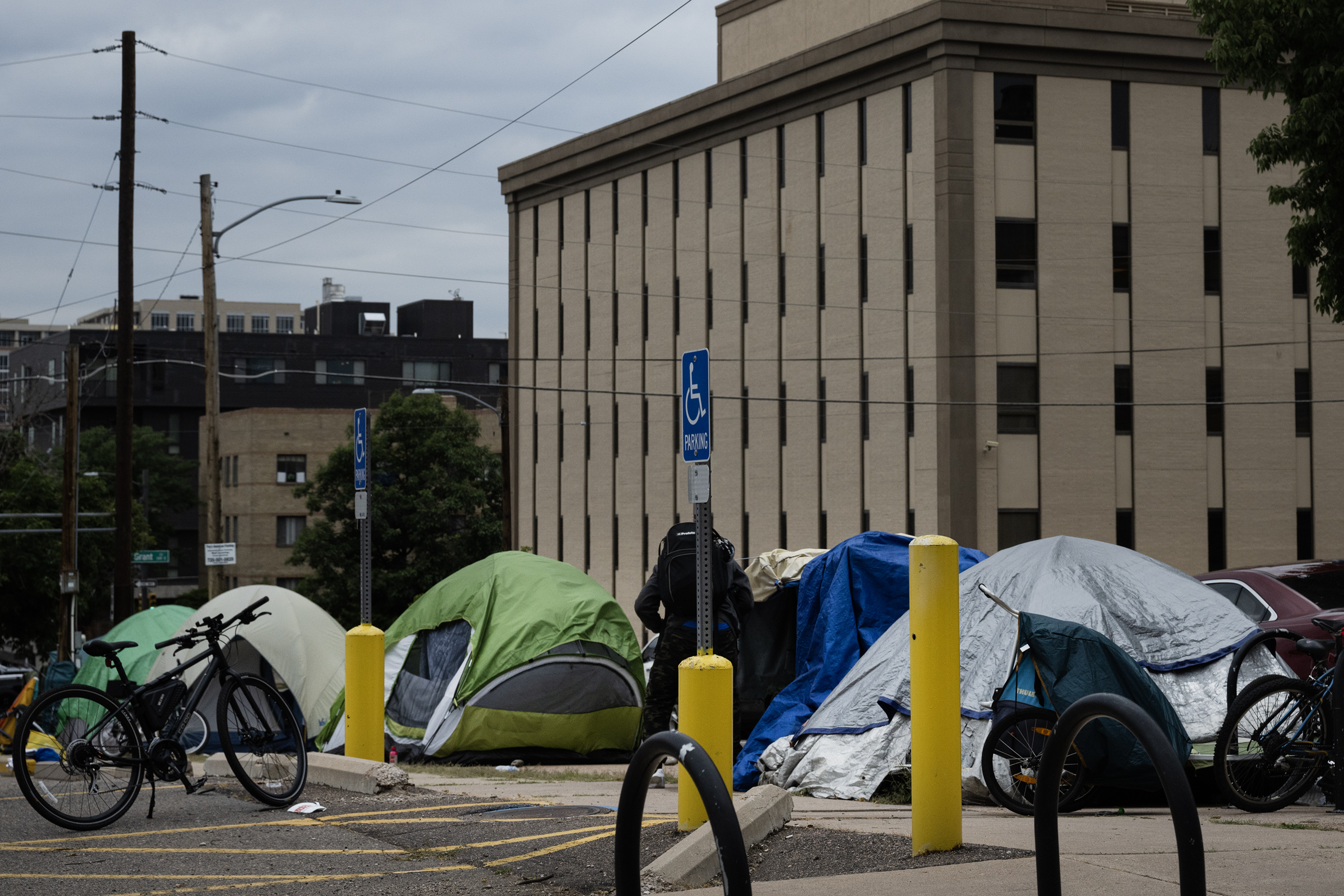 Tents can be seen on East 8th Avenue on Thursday, July 20, 2023, in Denver, Colo. (Timothy Hurst/Denver Gazette) (TimHursttim.hurst@gazette.comhttps://secure.gravatar.com/avatar/aca82bd62b4ee425c598527cd6faa1b1?d=mm&r=g)