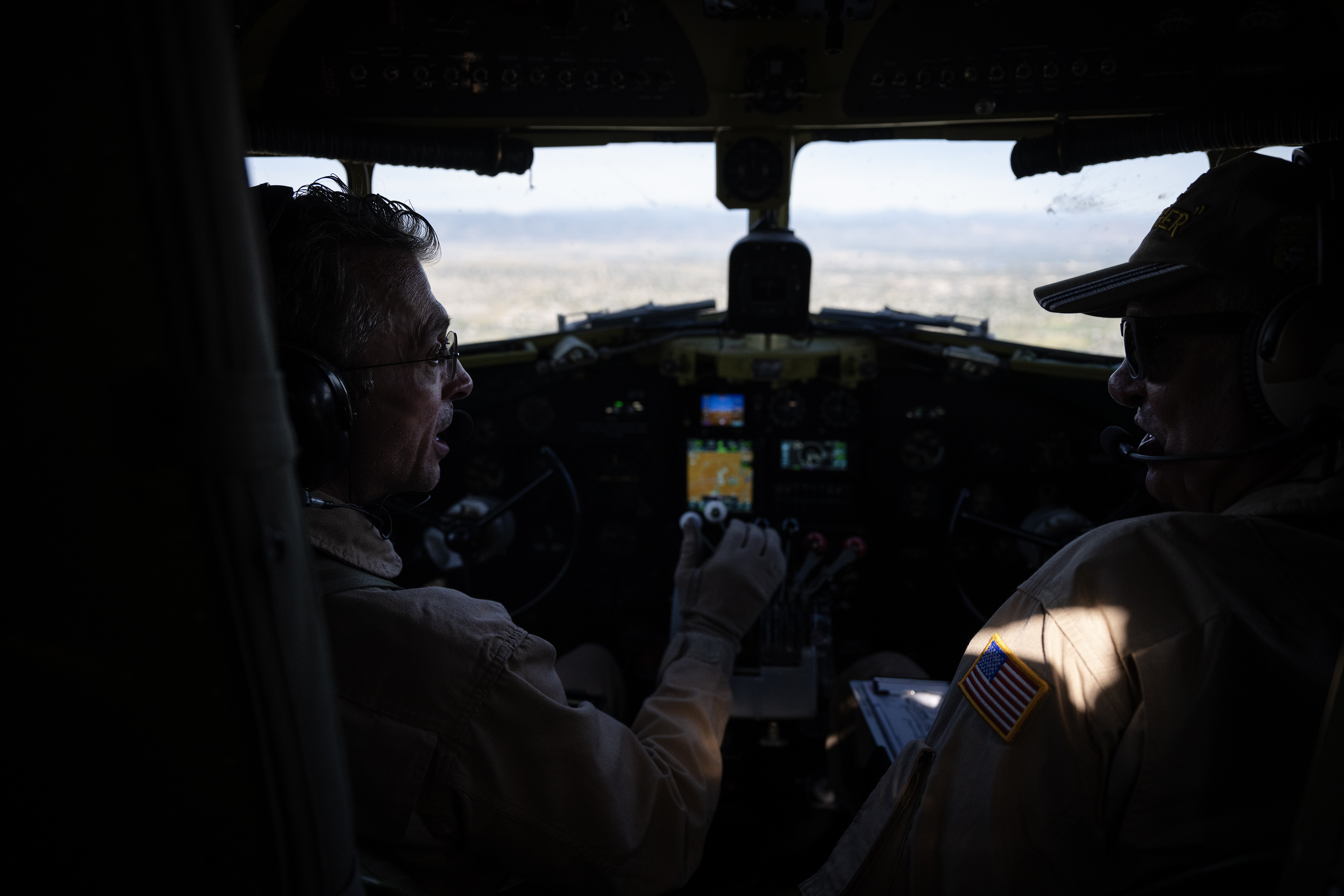 Pilot in command John Cotter, left, and co-pilot Rod Anthony fly the C-47A Skytrain troop transport “That’s All, Brother” west towards the foothills before turning back to Wings Over the Rockies Exploration of Flight at the Centennial Airport on Friday, Sept. 1, 2023, over the Denver metro area. “That’s All, Brother” lead the D-Day Normandy landings in 1944. (Timothy Hurst/Denver Gazette) (TimHursttim.hurst@gazette.comhttps://secure.gravatar.com/avatar/aca82bd62b4ee425c598527cd6faa1b1?d=mm&r=g)