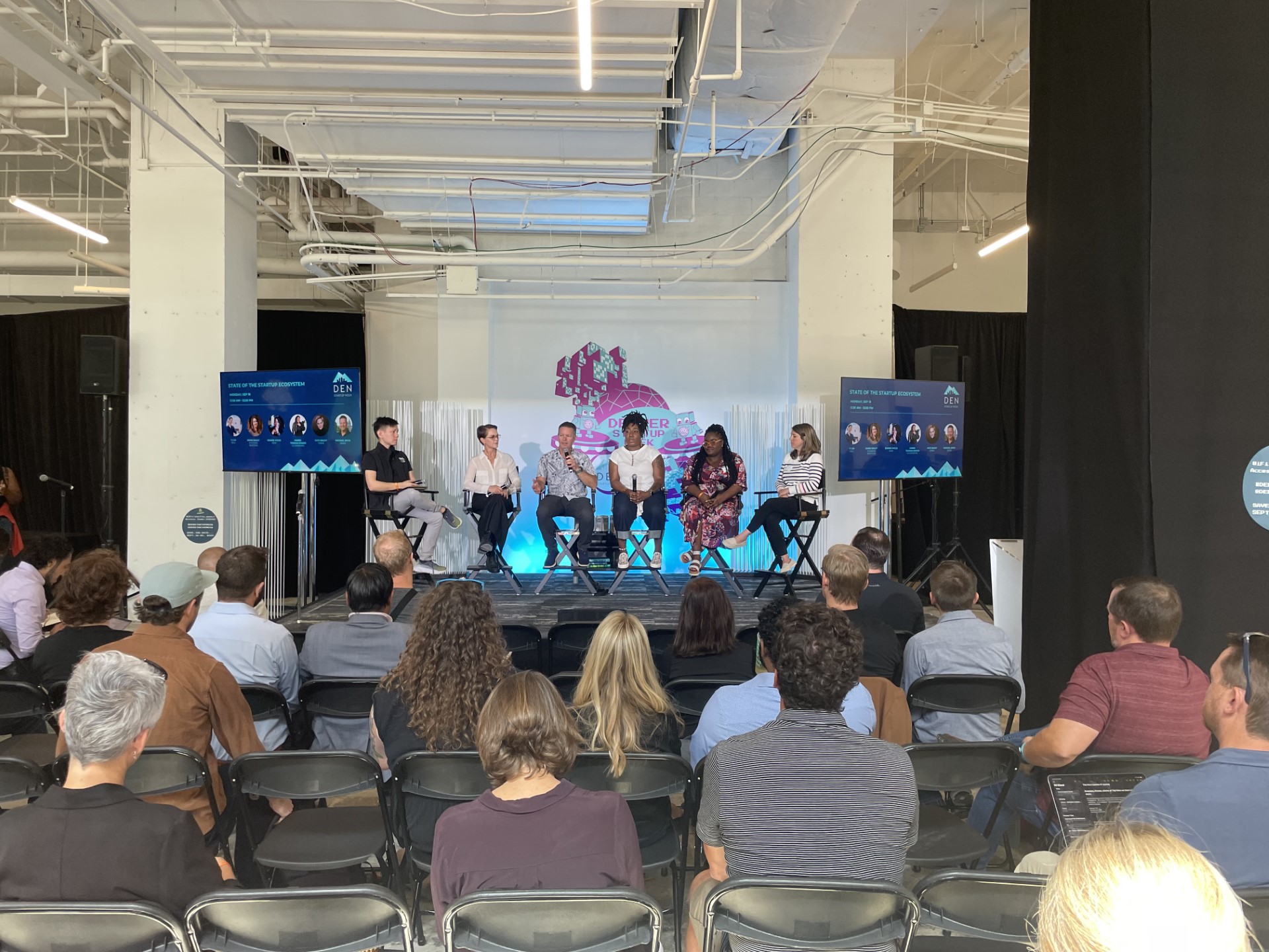 Panelists take the stage for a Denver Startup Week's session Monday called the 