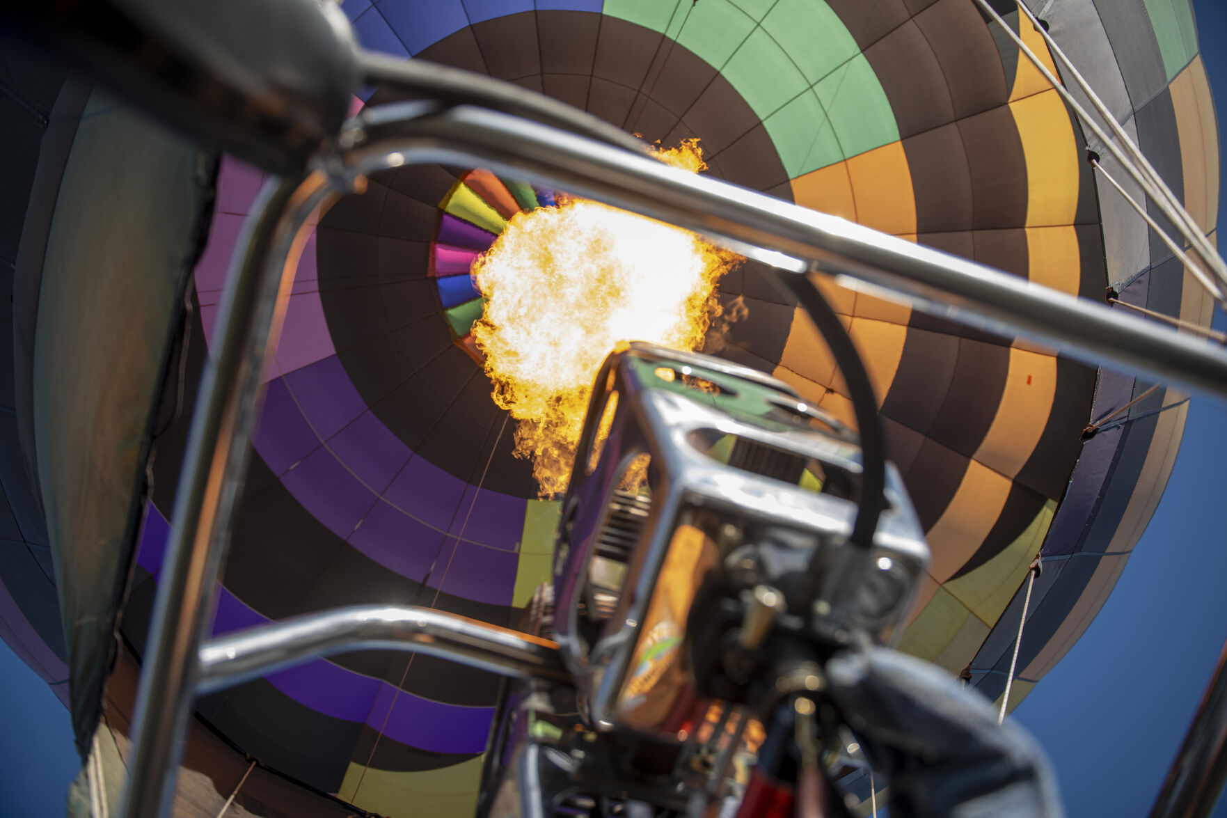 Heat is released into the balloon Synchronicity during the Labor Day Lift Off in Colorado Springs on Saturday, September 2, 2023. (Gabi Broekema)