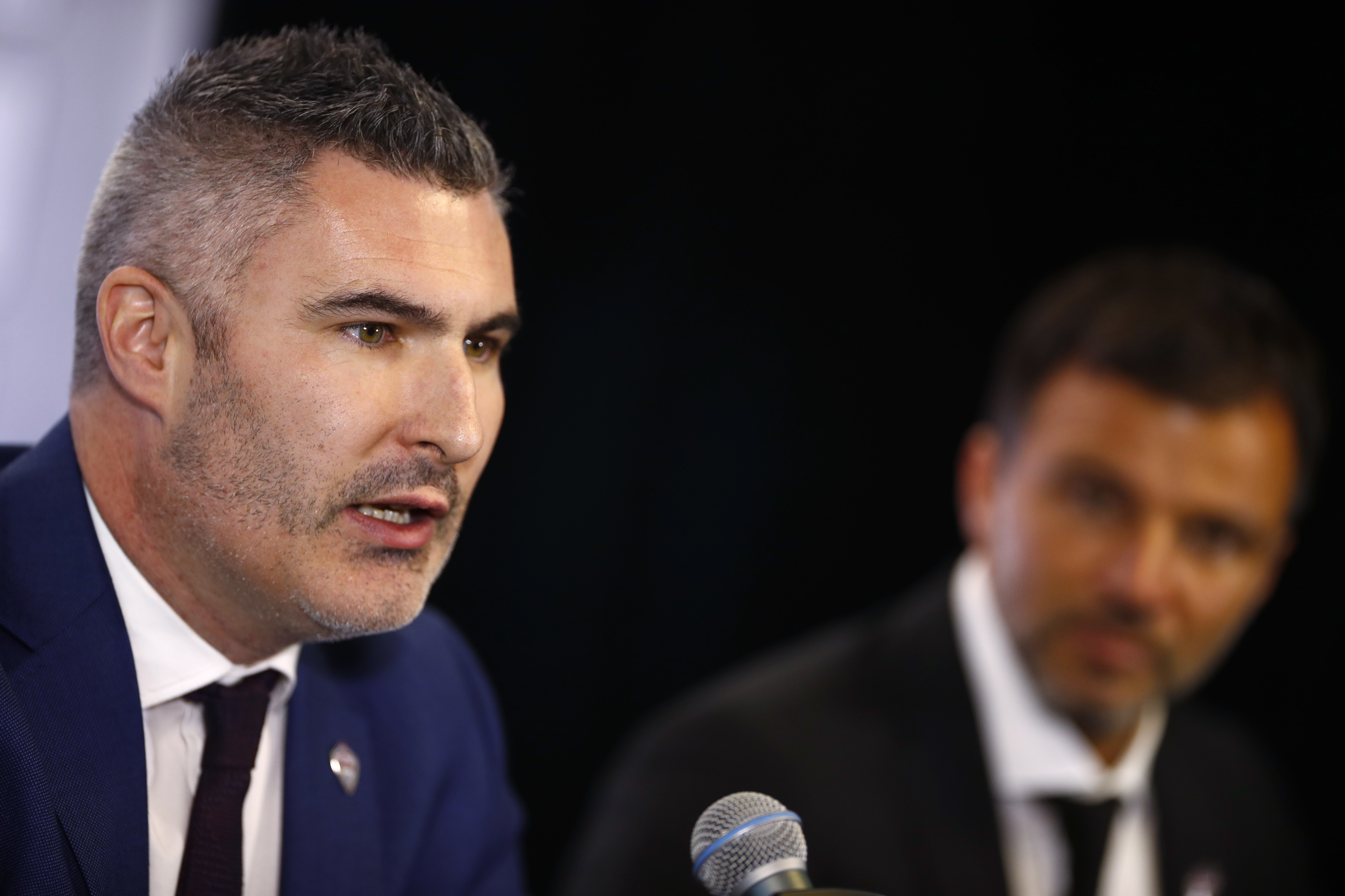 Padraig Smith, left, general manager and sporting director of the Colorado Rapids, responds to a question as Anthony Hudson, the MLS soccer team's new coach, listens during a news conference Thursday, Nov. 30, 2017, in Commerce City, Colo. Hudson has been managing the New Zealand national squad for the past three years. (AP Photo/David Zalubowski) (David Zalubowski)