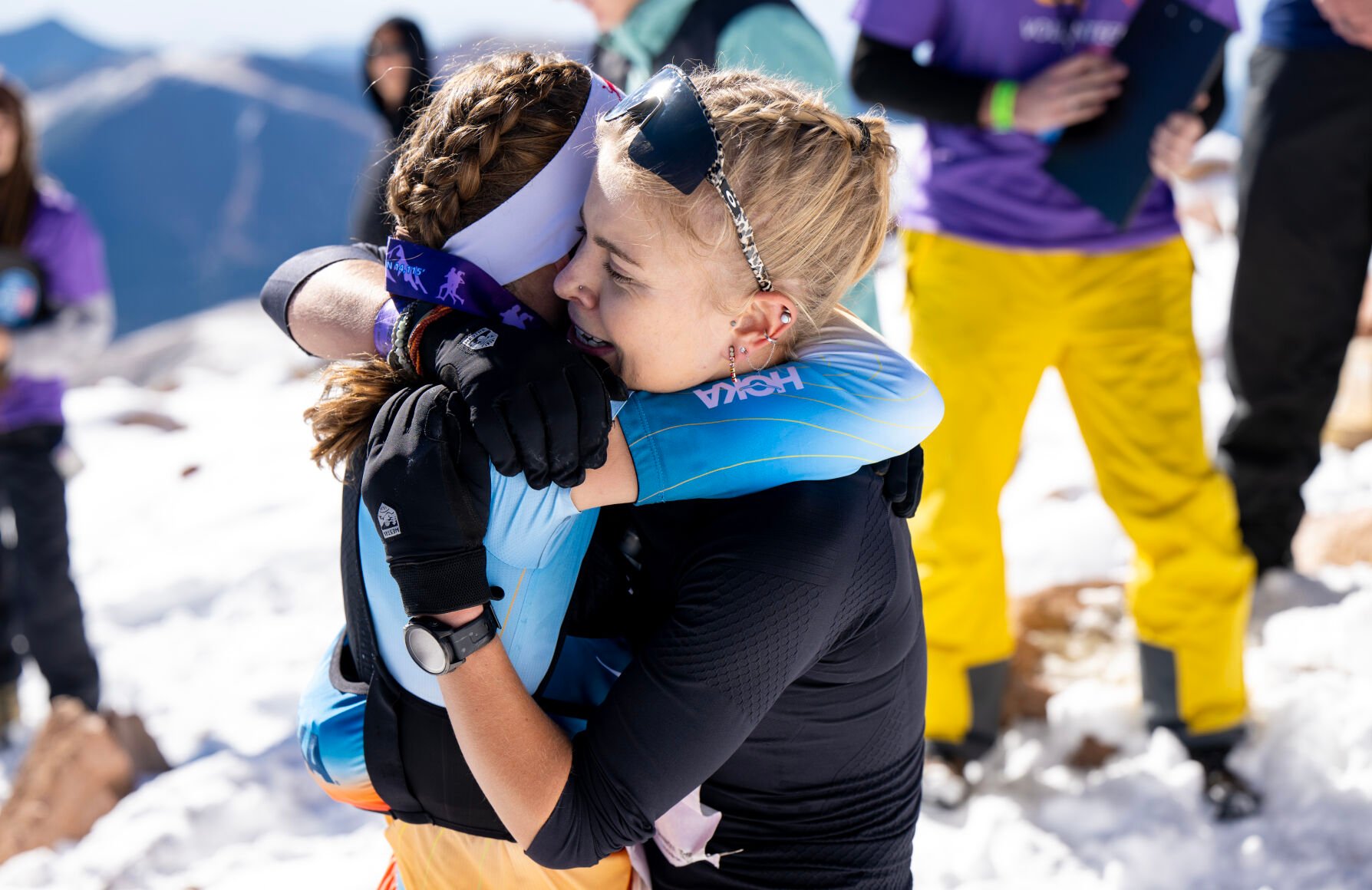 Sophia Laukli, right, the female champion of this year’s Pikes Peak Ascent hugs Judith Wyder who came in second at the summit of Pikes Peak following the race on Saturday, Sept. 16, 2023. “Thank you so much, you made the race for me,” Laukli said as the pair embraced. (Parker Seibold, The Gazette) (Parker Seibold)