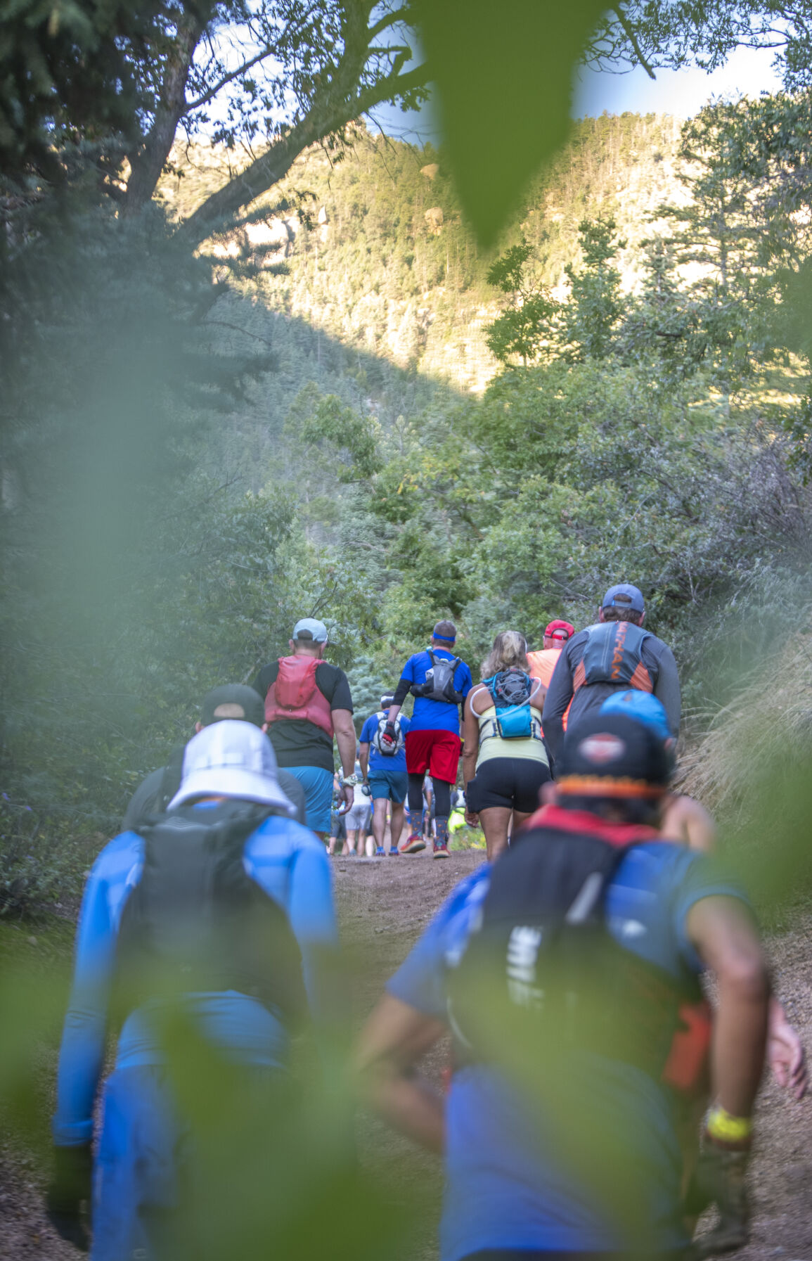 Pikes Peak Marathon runners hit dirt and beginning climbing up Barr Trail at the start of Pikes Peak Marathon in Manitou Springs on Sunday, September 17, 2023. (Gabi Broekema)