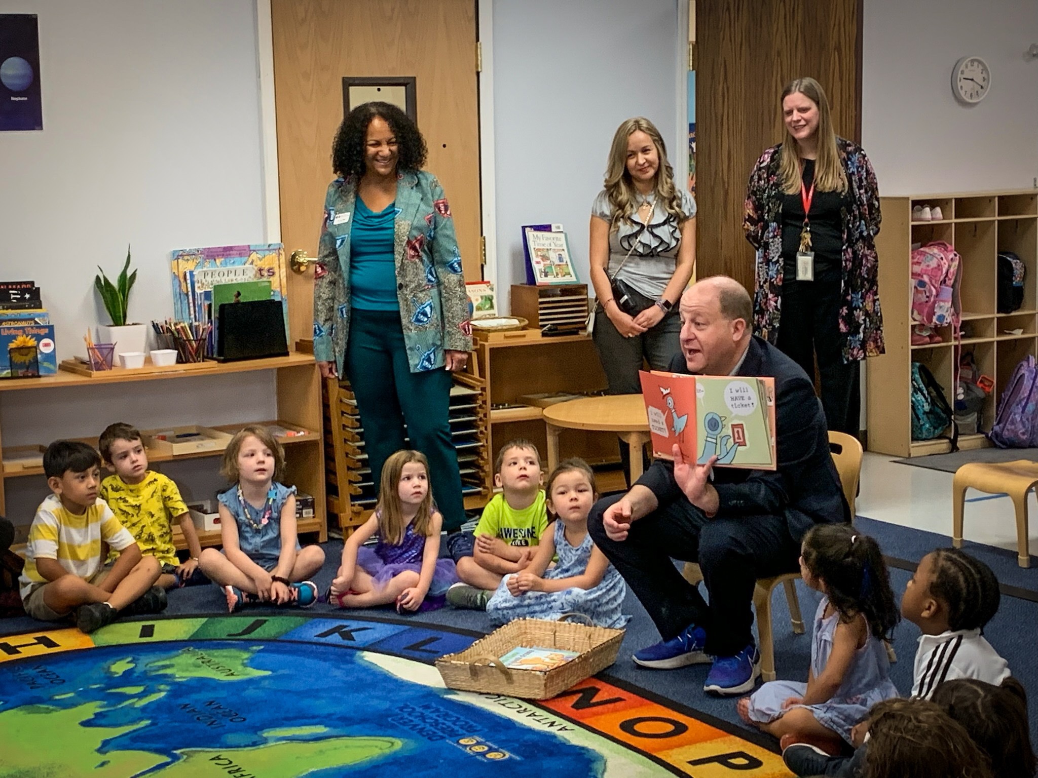 Colorado Gov. Jared Polis reads to preschoolers. (COURTESY: Governor's Office)