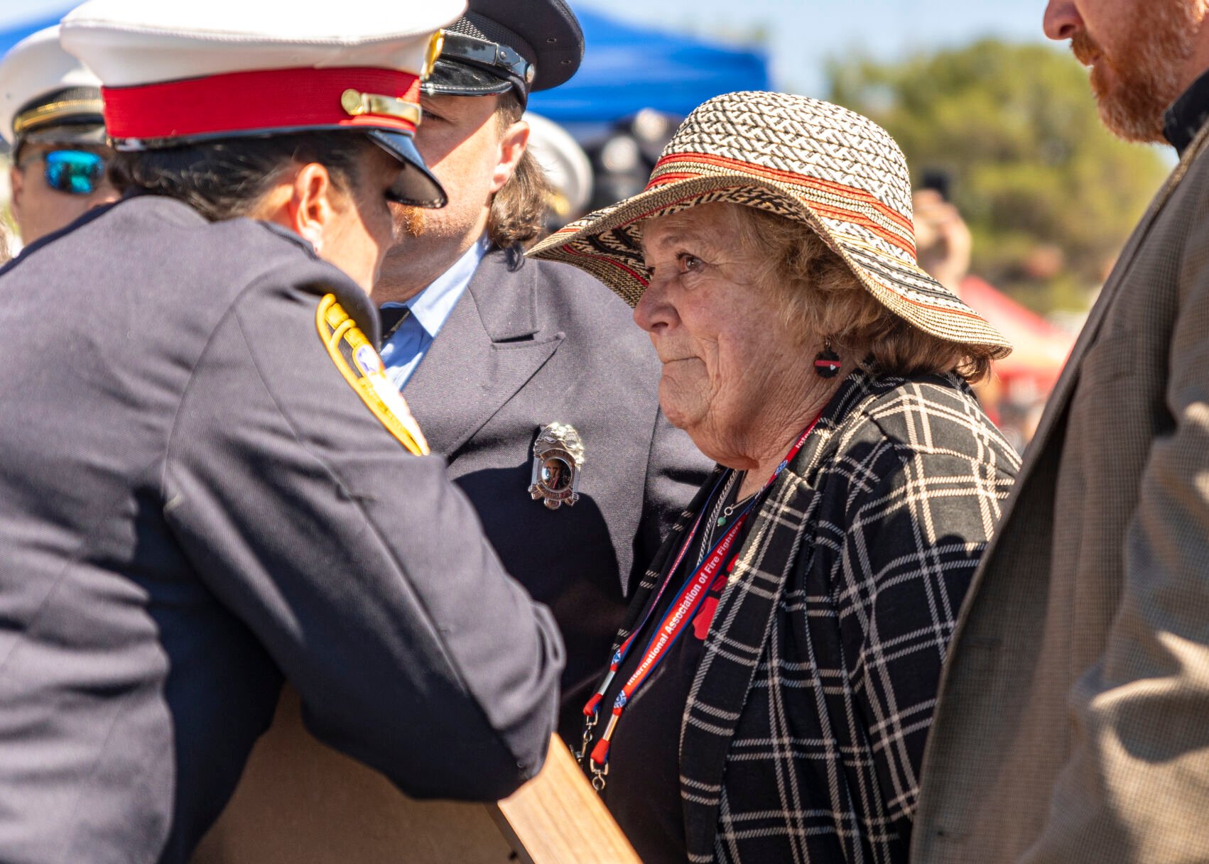 Gina Reed of Huston, Texas, remembers her son Tanner Graham Reed who she lost to COVID-19 in 2021 during the Fallen Fire Fighter Memorial 2023 Observance in Memorial Park on Saturday, September 16, 2023. (Gabi Broekema)
