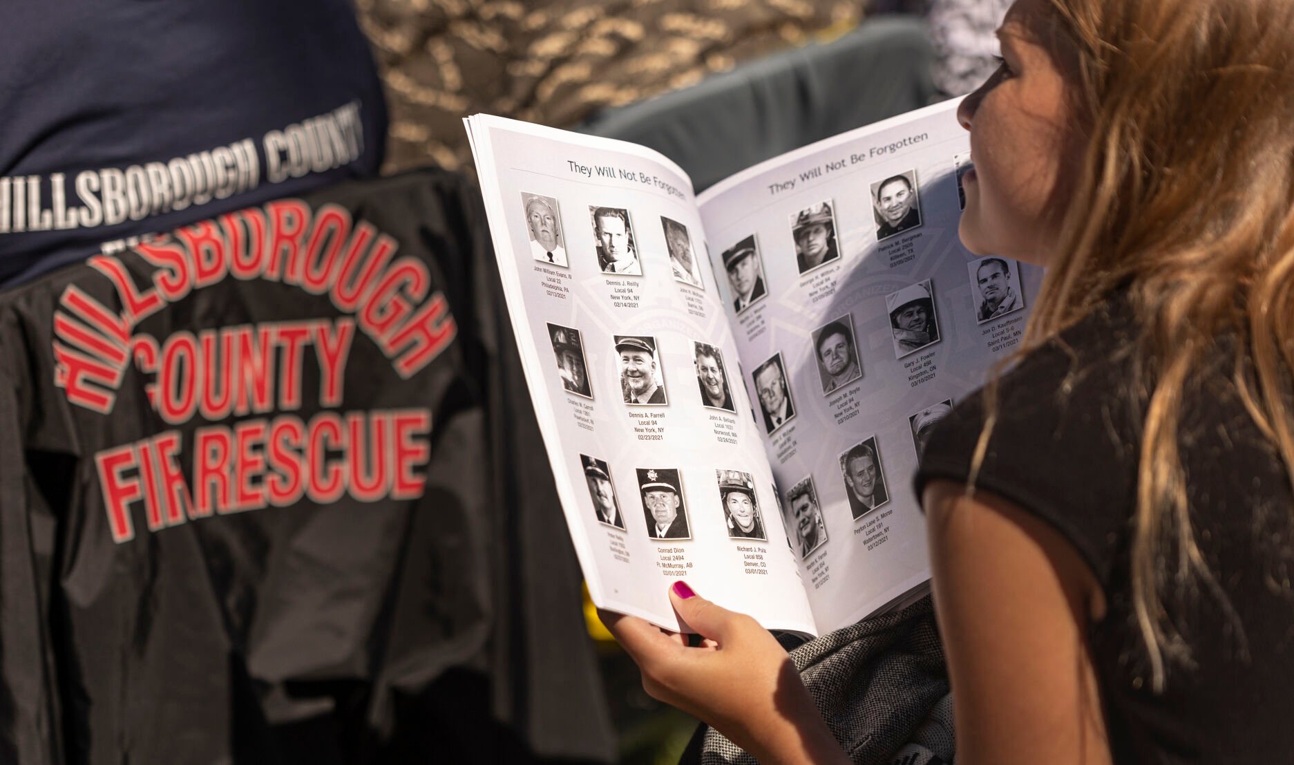 Families, friends and fellow firefighters respect and remember 572 fallen firefighters during the Fallen Fire Fighter Memorial 2023 Observance in Memorial Park on Saturday, September 16, 2023. (Gabi Broekema)