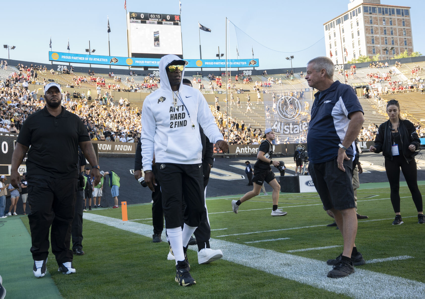 Colorado head coach Deion Sanders walks the field before the Buffaloes game against the Nebraska Cornhuskers Saturday at Folsom Field in Boulder. (Christian Murdock, The Gazette)