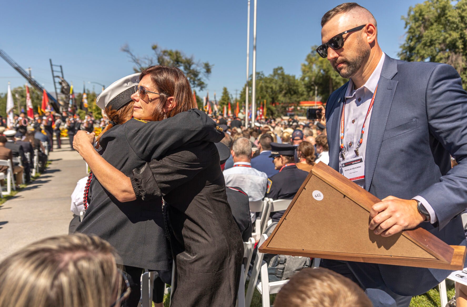 Jamie Spinella remembers her passed husband Jeffery Thomas Ruzzo during the Fallen Fire Fighter Memorial 2023 Observance in Memorial Park on Saturday, September 16, 2023. (Gabi Broekema)