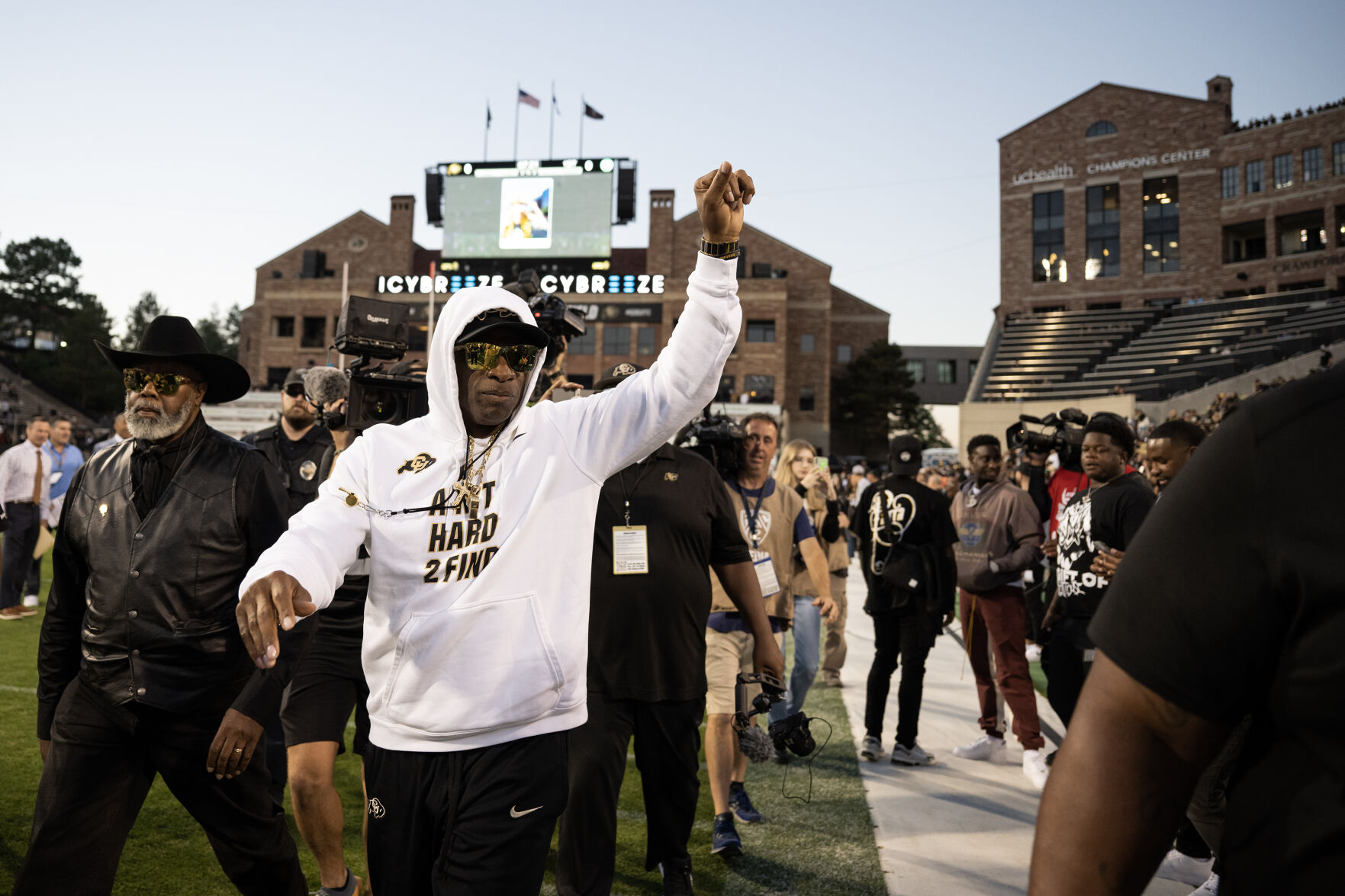 Colorado Buffaloes head coach Deion Sanders raises his fist to the student section as he takes the field before the first half of the Rocky Mountain Showdown against Colorado State University at Folsom Field on Saturday, Sept. 16, 2023, in Boulder, Colo. (Timothy Hurst/Denver Gazette) (TimHursttim.hurst@gazette.comhttps://secure.gravatar.com/avatar/aca82bd62b4ee425c598527cd6faa1b1?d=mm&r=g)