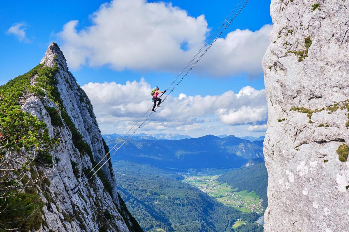 Via ferrata Donnerkogel Intersport via ferra in the Austrian Alps, near Gosau. Stairway to Heaven concept.