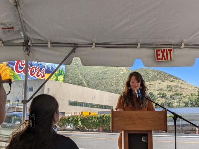 Coors mural artist at celebration