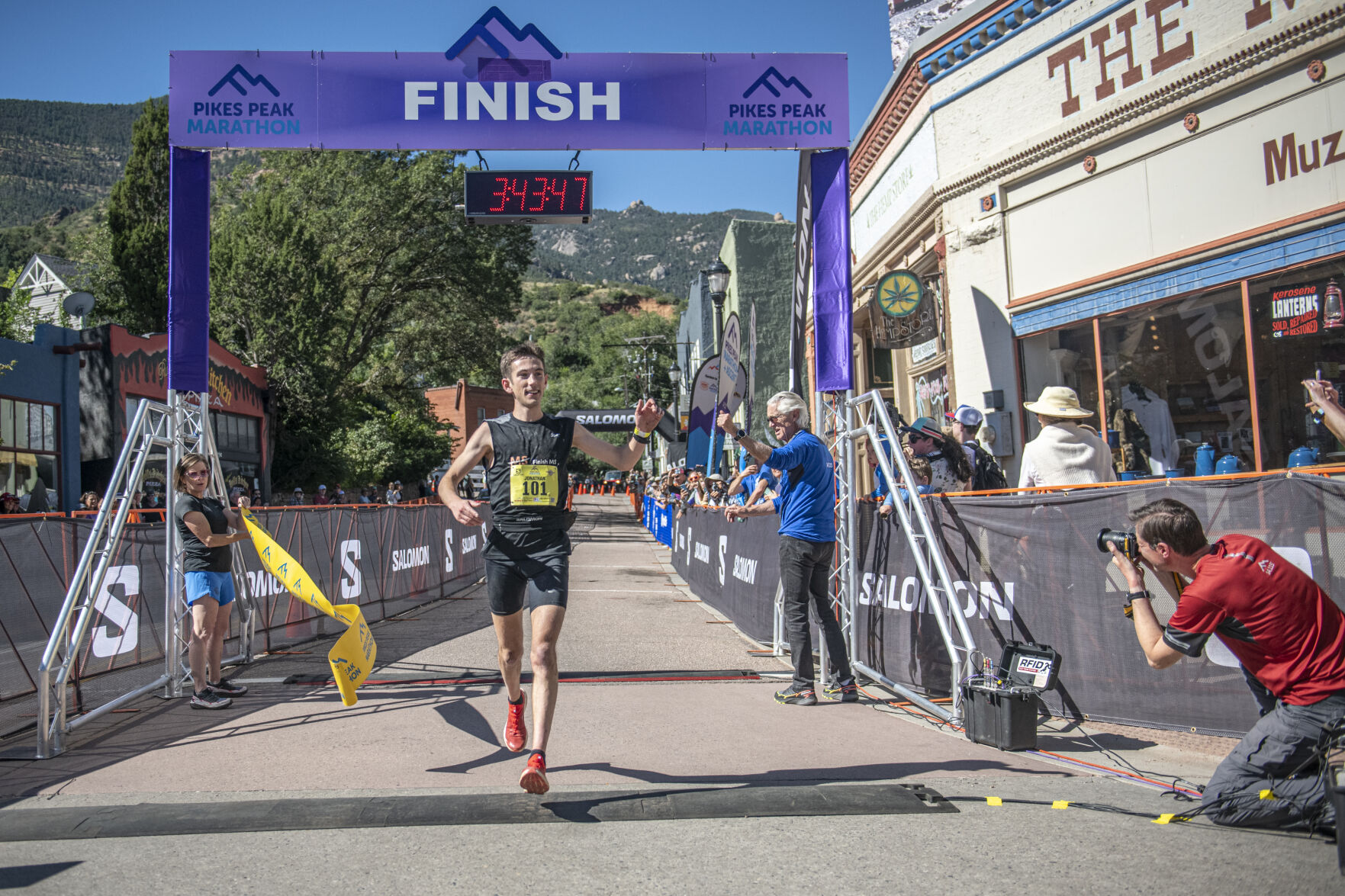 Pikes Peak Marathon 2022 Winner Jonathan Aziz crosses the finish line for the 2023 Pikes Peak Marathon in Manitou Springs on Sunday, September 17, 2023. Aziz won for the race for the second time in a row with a time of 3:43:45 as DeMoor came in 2nd overall and 1st Doubler. (Gabi Broekema)