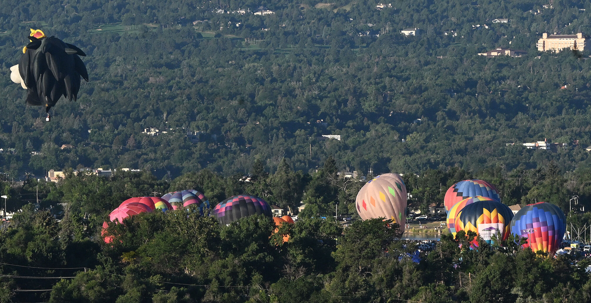 A balloon flies near downtown Colorado Springs on Monday, Sept. 4, 2023 during the Colorado Springs Labor Day Lift Off. (Photo by Jerilee Bennett, The Gazette)